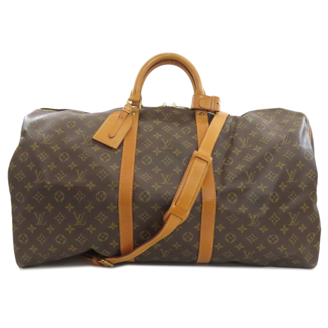 Louis Vuitton monogram canvas bag: Louis Vuitton monogram canvas bag The Louis Vuitton monogram canvas bag features iconic brown exterior with classic Boston style design. Made from high-quality monogram canvas, this timeless piece boa