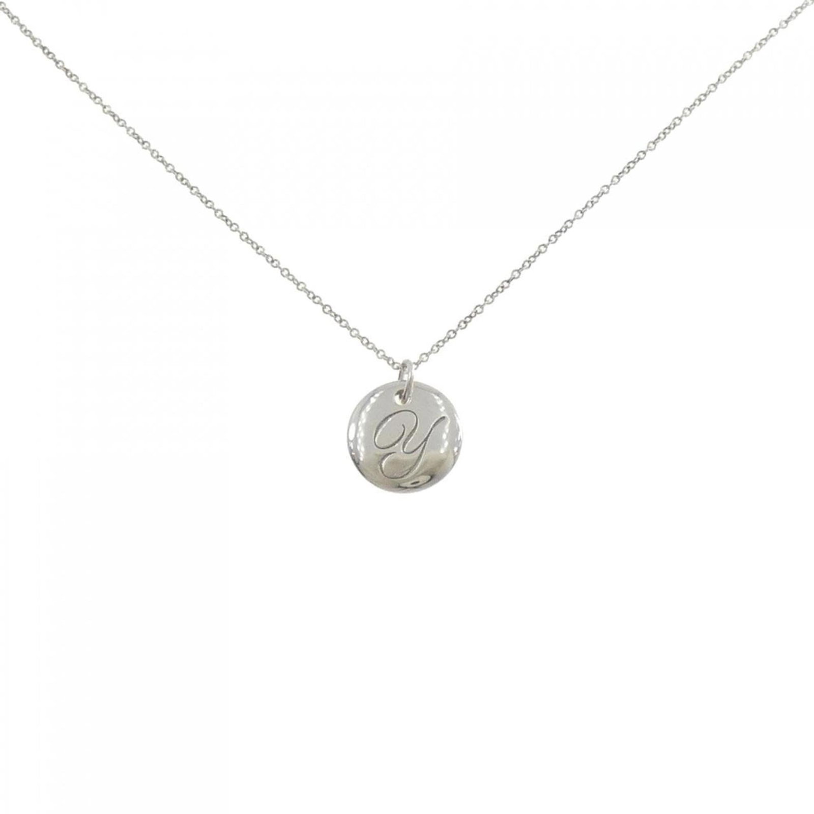 Tiffany Notes Small Necklace: Tiffany Notes Small Necklace The Tiffany Notes Small Necklace boasts a sleek silver design with a subtle 15.1mm x 12.5mm pendant size, making it a delicate addition to any outfit. With its 46 cm / 18.