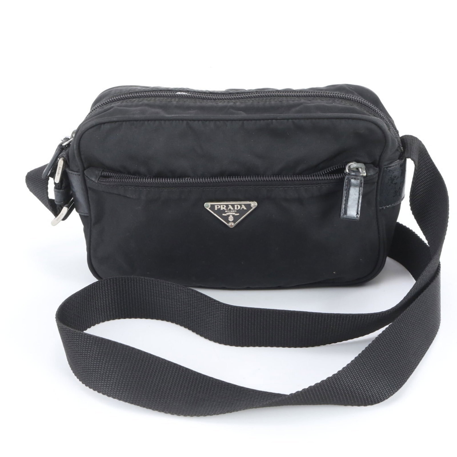 Prada Shoulder Bag Nylon Leather: Prada Shoulder Bag Nylon Leather The Prada Shoulder Bag Nylon Leather is a versatile and stylish accessory. Made from high-quality nylon and leather, this black shoulder bag features a sleek design wi