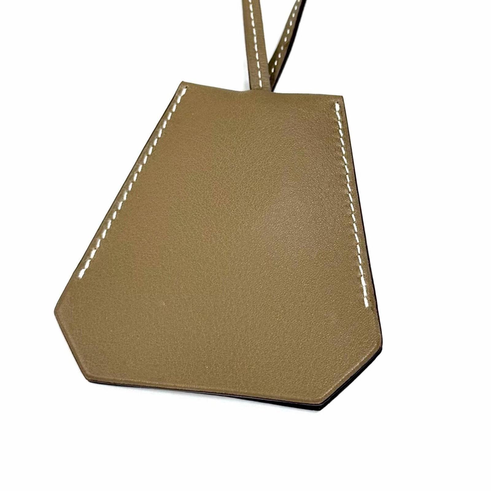 Hermes Etoupe Leather Clochette Necklace Charm With Silver Hardware C Stamp Box Included Made In: Hermes Etoupe Leather Clochette Necklace Charm With Silver Hardware C Stamp Box Included Made In France Women'S. Made in France, this Herm?s Etoupe Leather Clochette Necklace Charm boasts