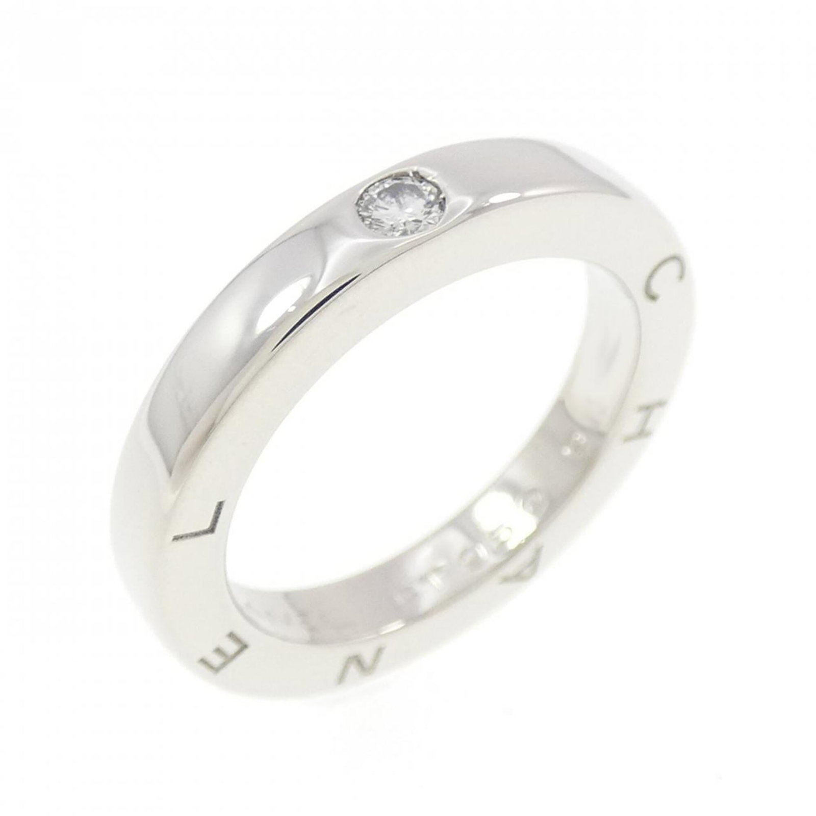 Chanel Band Ring Platinum 950: Chanel Band Ring Platinum 950 Platinum band ring from Chanel featuring a diamond stone, measuring 2.9mm in width and weighing 7.7g. This used item has some minor scratches and dirt, but remains in ver