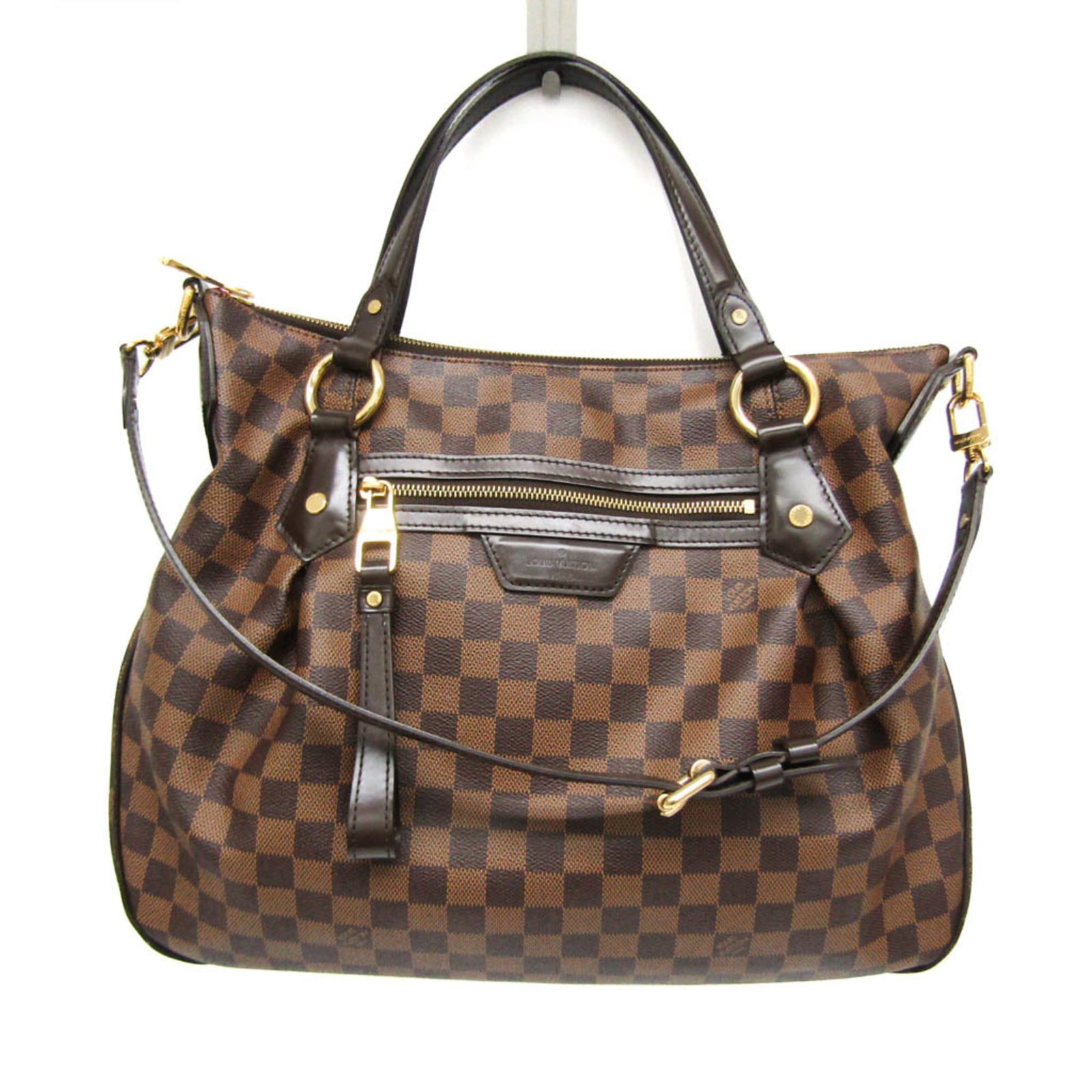 Louis Vuitton Shoulder Bag Damier Canvas: Louis Vuitton Shoulder Bag Damier Canvas The Louis Vuitton Shoulder Bag Damier Canvas boasts its iconic Damier canvas design in Ebene, complemented by gold hardware and a sleek zipper closure. This ve