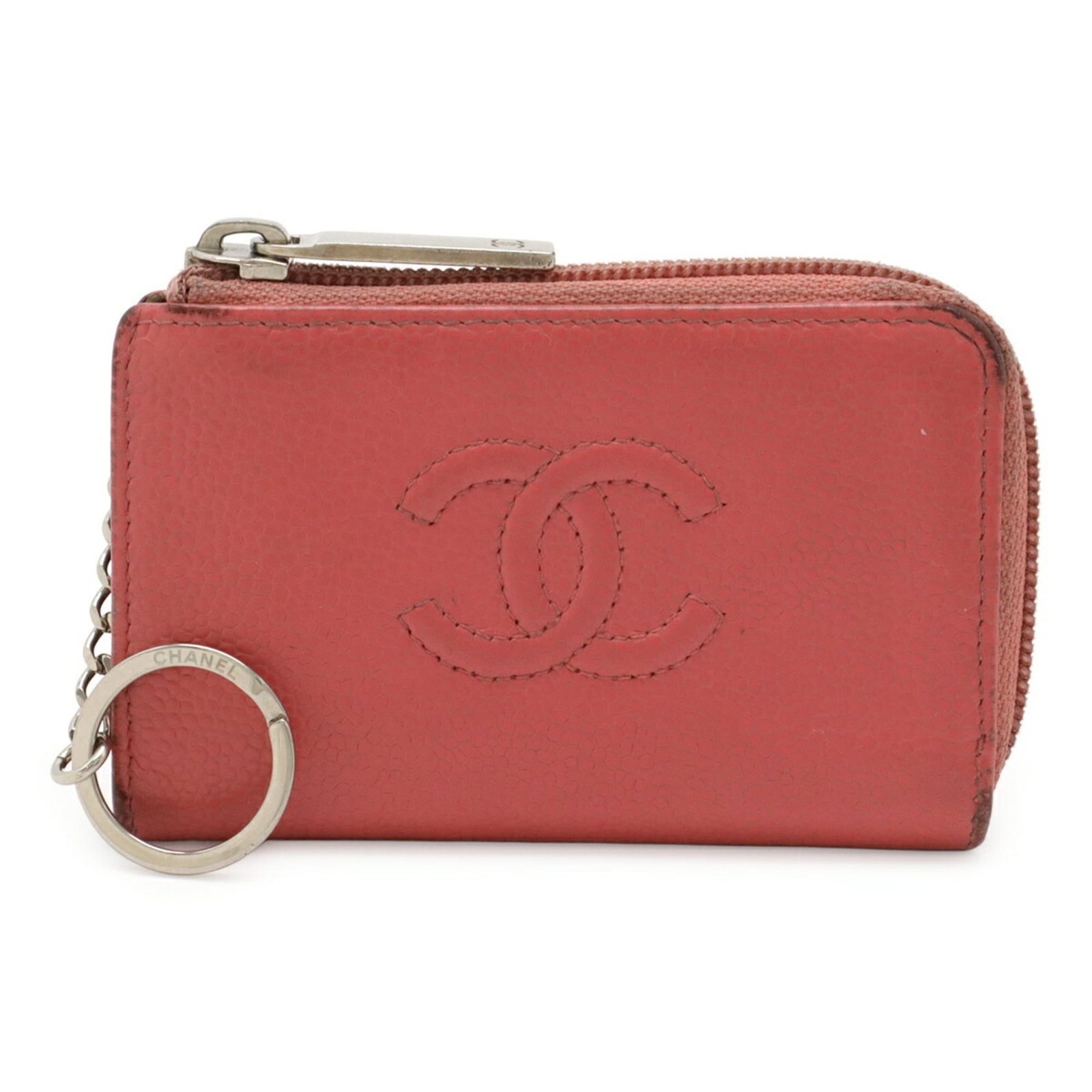 Chanel Coin Purse/Coin Case Grained Calfskin: Chanel Coin Purse/Coin Case Grained Calfskin The Chanel Coin Purse/Coin Case Grained Calfskin features a classic design with a soft pink hue, adding a touch of elegance to any outfit. Made from high-q
