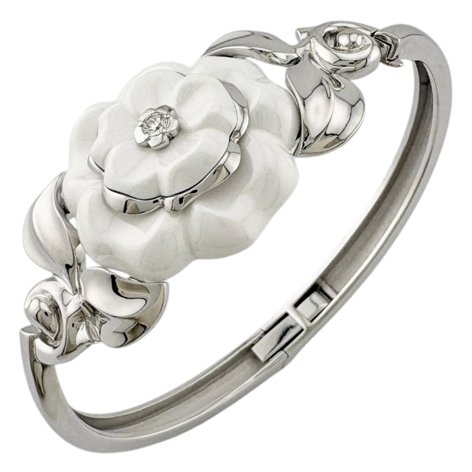 Chanel Bangle White Gold (18K): Chanel Bangle White Gold (18K) This Chanel bangle is crafted from 18K white gold and features a sleek design. With its classic style and subtle wear, this piece showcases a few traces of usage, includ