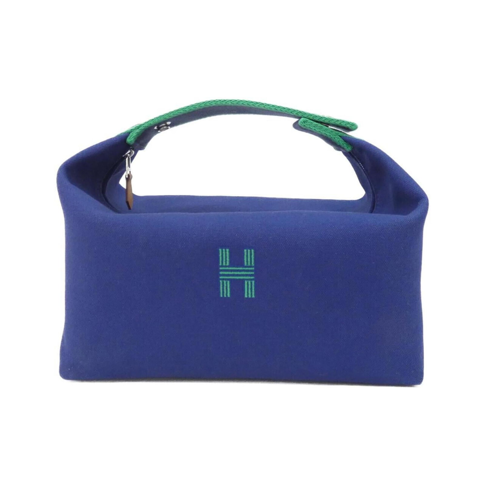 Hermes Handbag Pouch Canvas: Hermes Handbag Pouch Canvas This Hermes Handbag Pouch Canvas features a striking blue canvas material with silver hardware. The pouch measures 21cm x 25cm x 14cm and has some minor scratches and dirt 