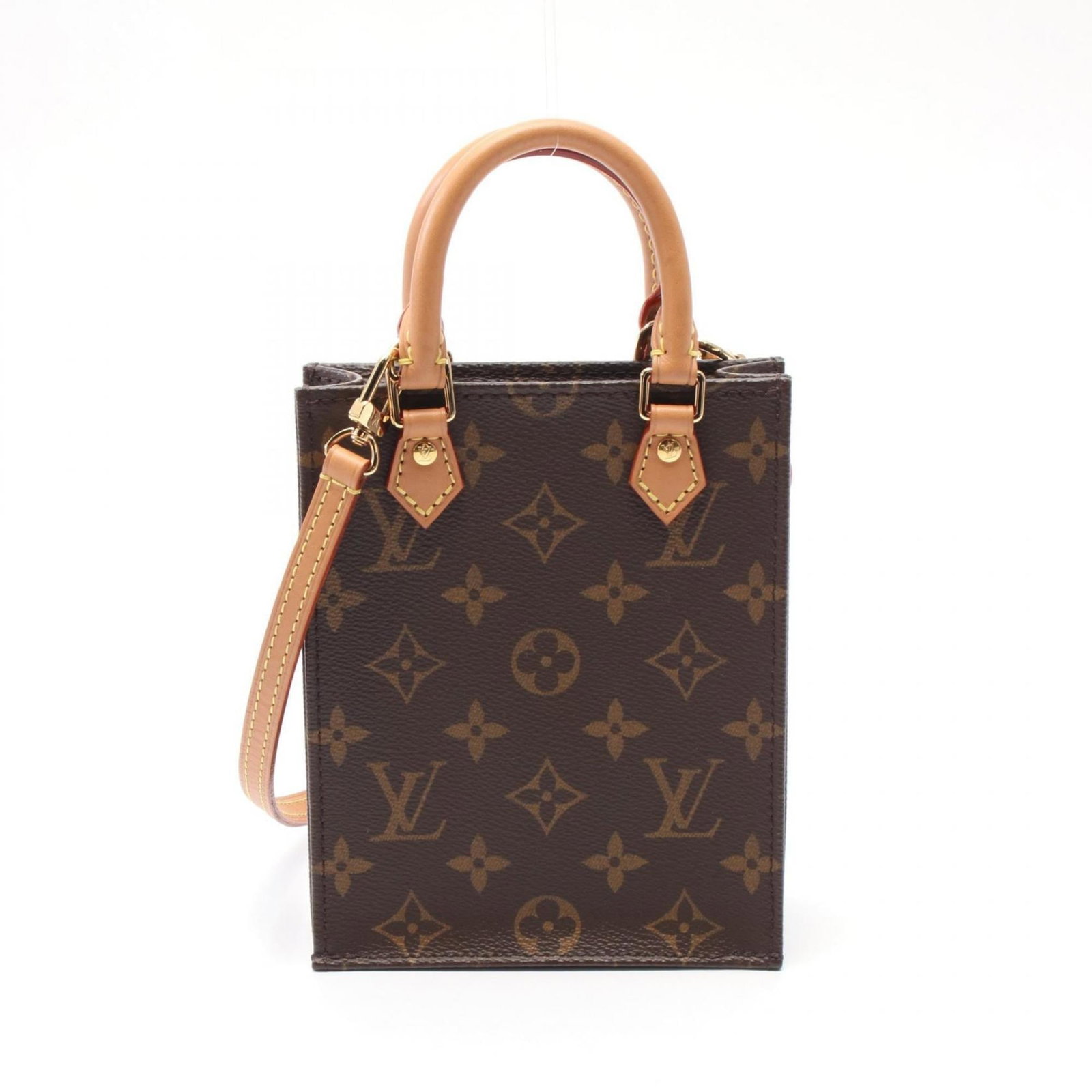 Louis Vuitton Handbag Coated Canvas Leather: Louis Vuitton Handbag Coated Canvas Leather The Louis Vuitton Handbag Coated Canvas Leather is a stylish and durable women's bag with a classic brown color. Measuring 17cm x 13.5cm x 4.5cm, this handb