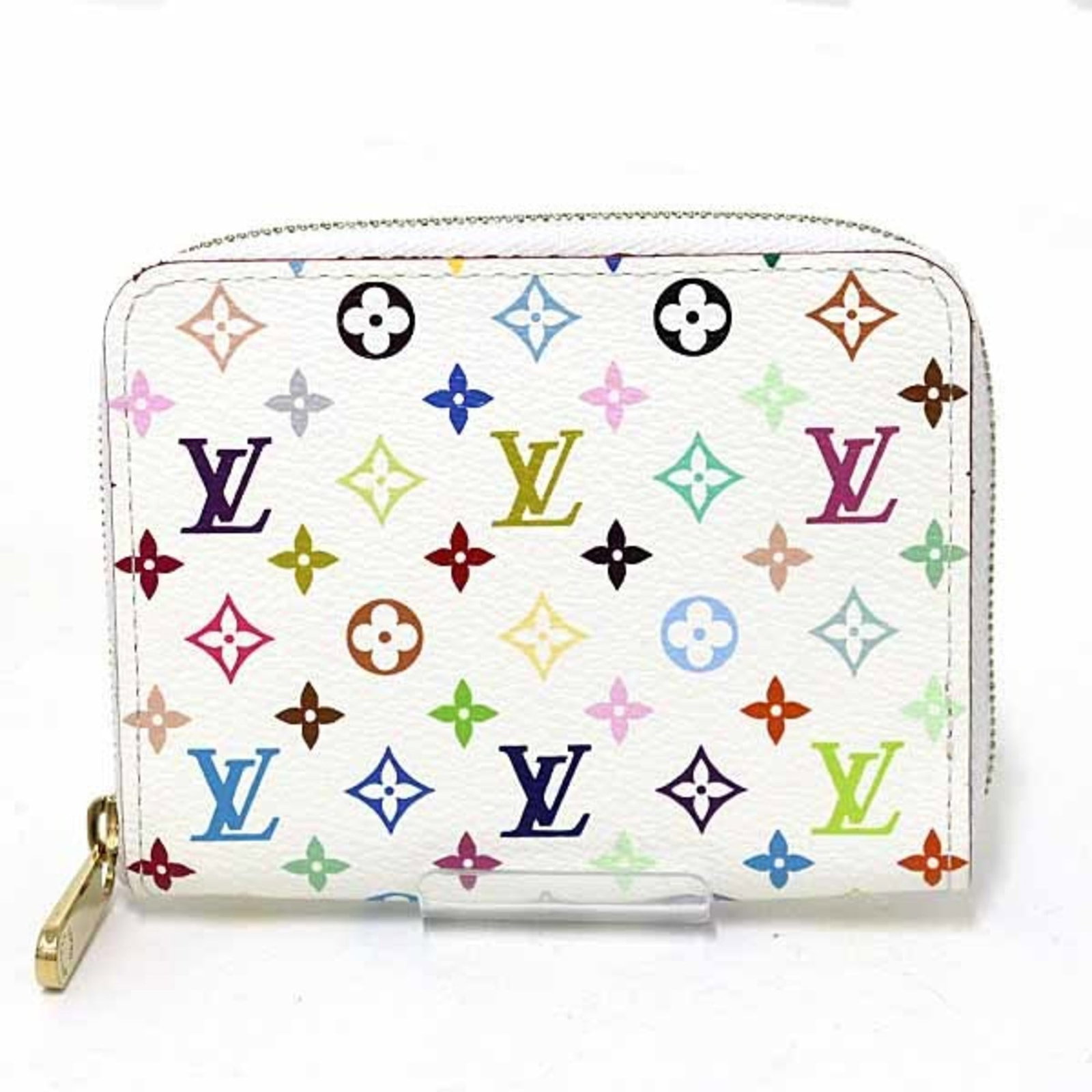 Louis Vuitton Coin Purse/Coin Case Monogram Multicolore: Louis Vuitton Coin Purse/Coin Case Monogram Multicolore Louis Vuitton's iconic Monogram Multicolore design adorns this stylish Coin Purse/Coin Case, adding a touch of luxury to any outfit. Made from h