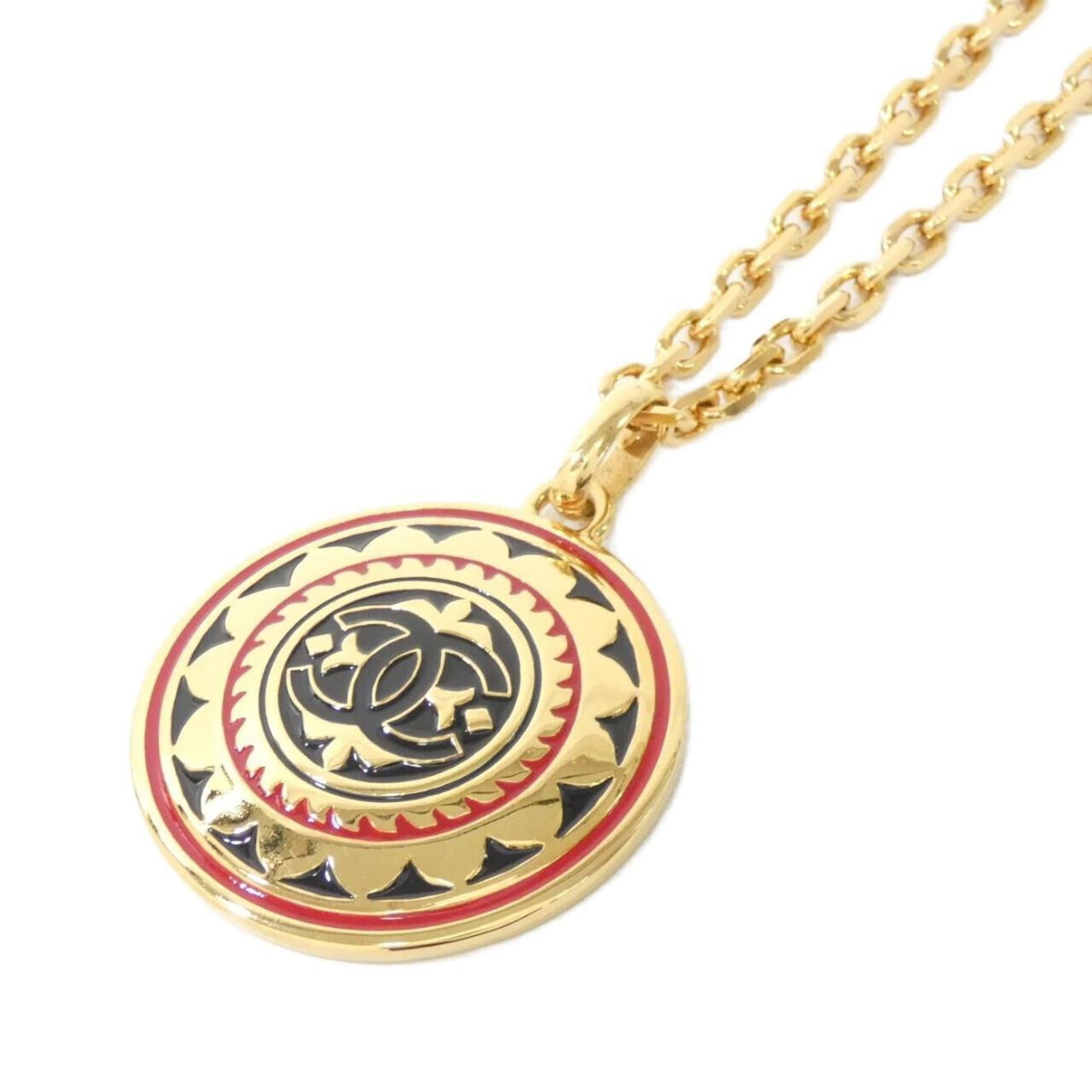 Chanel Necklace: Chanel Necklace Used Chanel Necklace in very good condition. The necklace features a black, gold, and red design with a 60mm x 60mm pendant, suitable for a neck circumference of approximately 80 cm.
