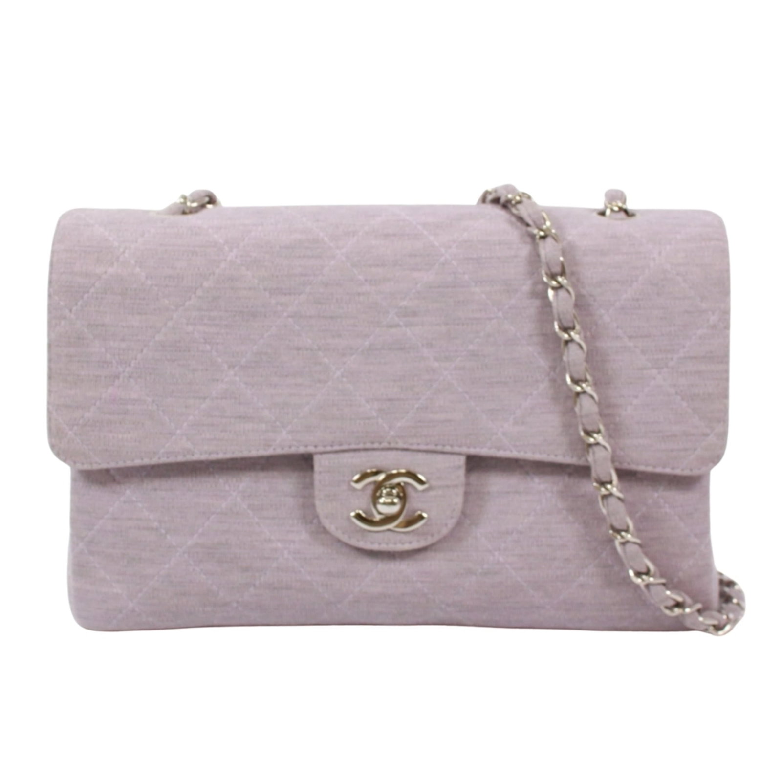Chanel Shoulder Bag Cotton Leather: Chanel Shoulder Bag Cotton Leather Cotton and leather come together in this classic Chanel shoulder bag, featuring a timeless gray color. The bag has been used and shows some signs of wear, with a few