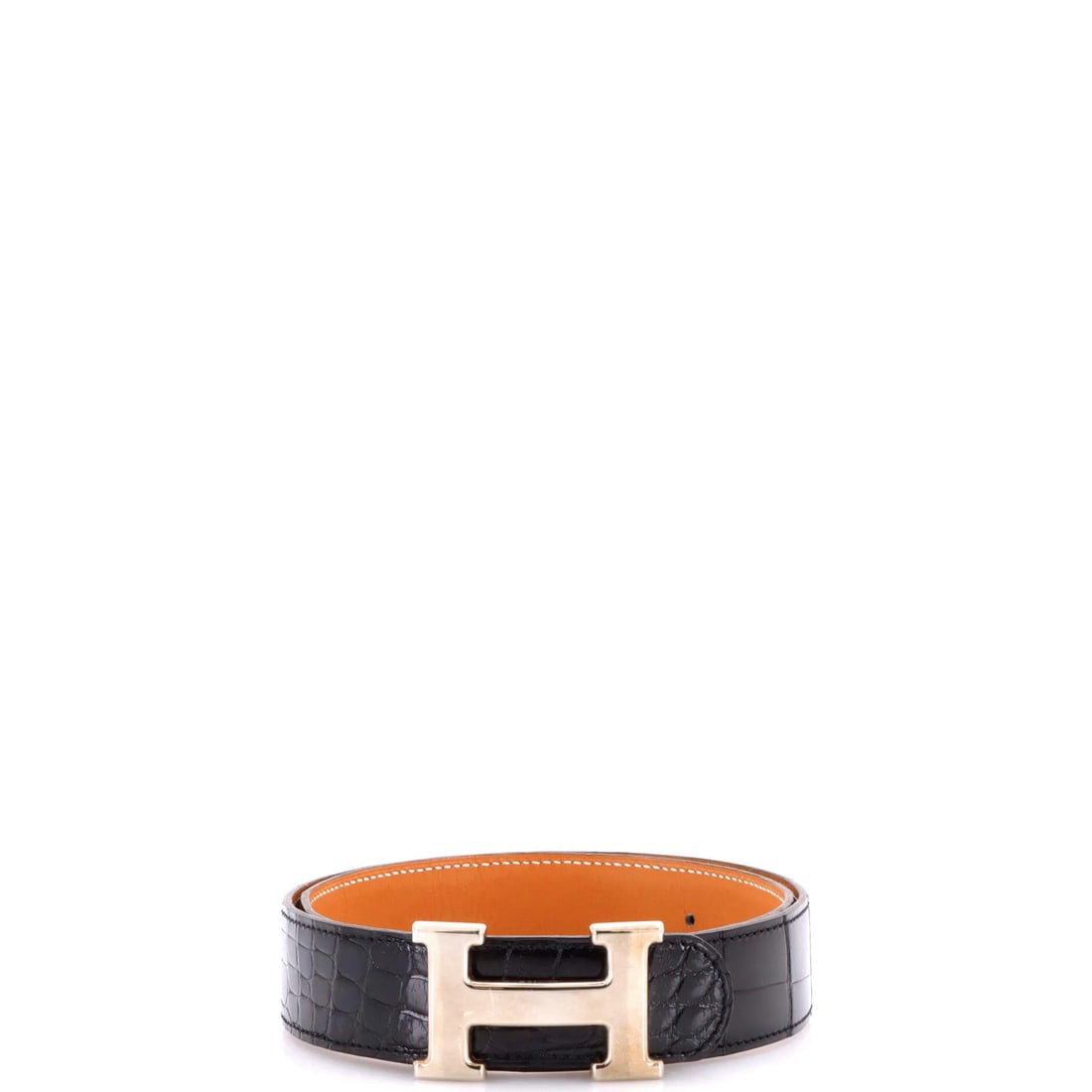 Medium Shiny Alligator Belt Constancy: Medium Shiny Alligator Belt Constancy The Constance Belt from Hermes features a striking medium shiny alligator exterior in black, adding an exotic touch to any outfit. This classic belt boasts