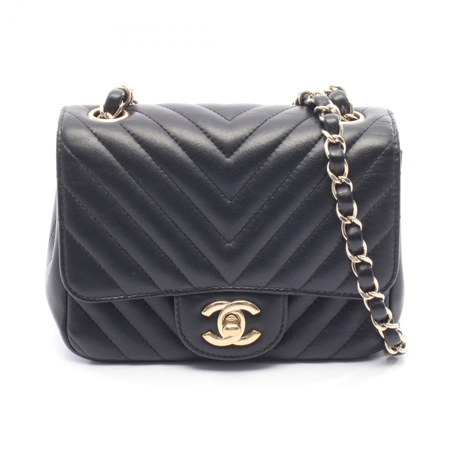 Chanel Handbag Shoulder Bag Leather: Chanel Handbag Shoulder Bag Leather The Chanel Handbag Shoulder Bag Leather is a timeless piece with its lambskin material and classic design. Measuring 13cm x 17cm x 8cm, this shoulder bag features a