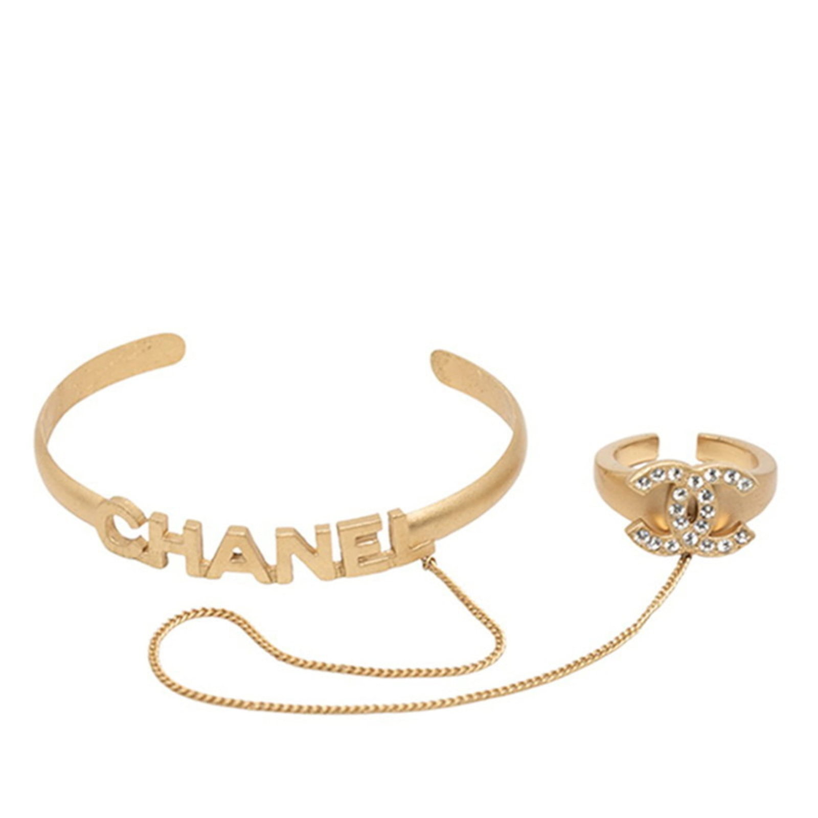 Chanel Band Ring Gold Plating: Chanel Band Ring Gold Plating Gold Plating Details Stand Out on This Chanel Band Ring. The rhinestone stone adds a touch of glamour to this classic design, while the gold plating gives it a luxurious