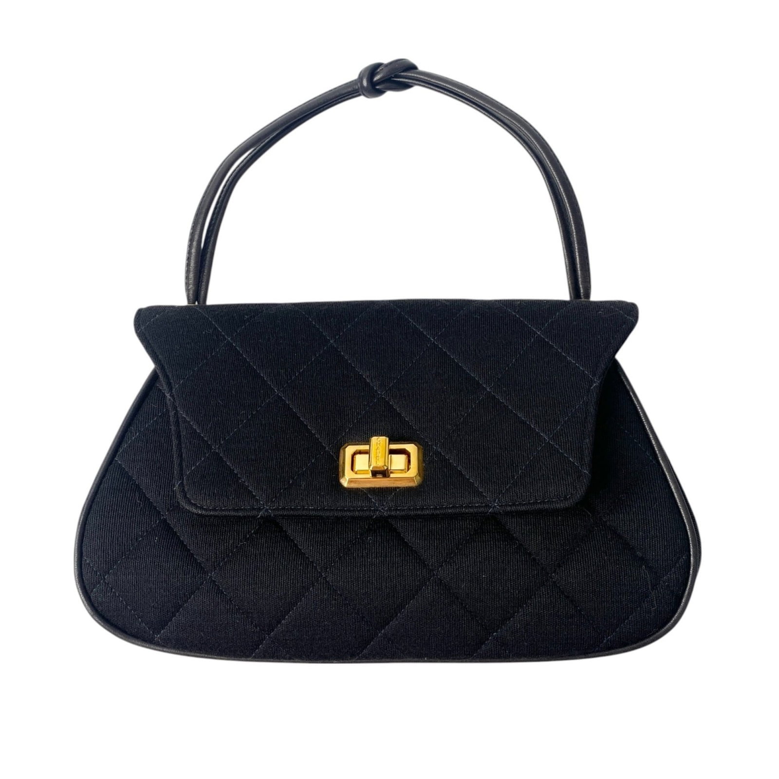 Chanel Handbag Cotton Leather: Chanel Handbag Cotton Leather Cotton and leather blend in this classic Chanel handbag, featuring gold hardware and a turn lock closure. Measuring 15cm x 25cm x 6.5cm, its compact size belies the