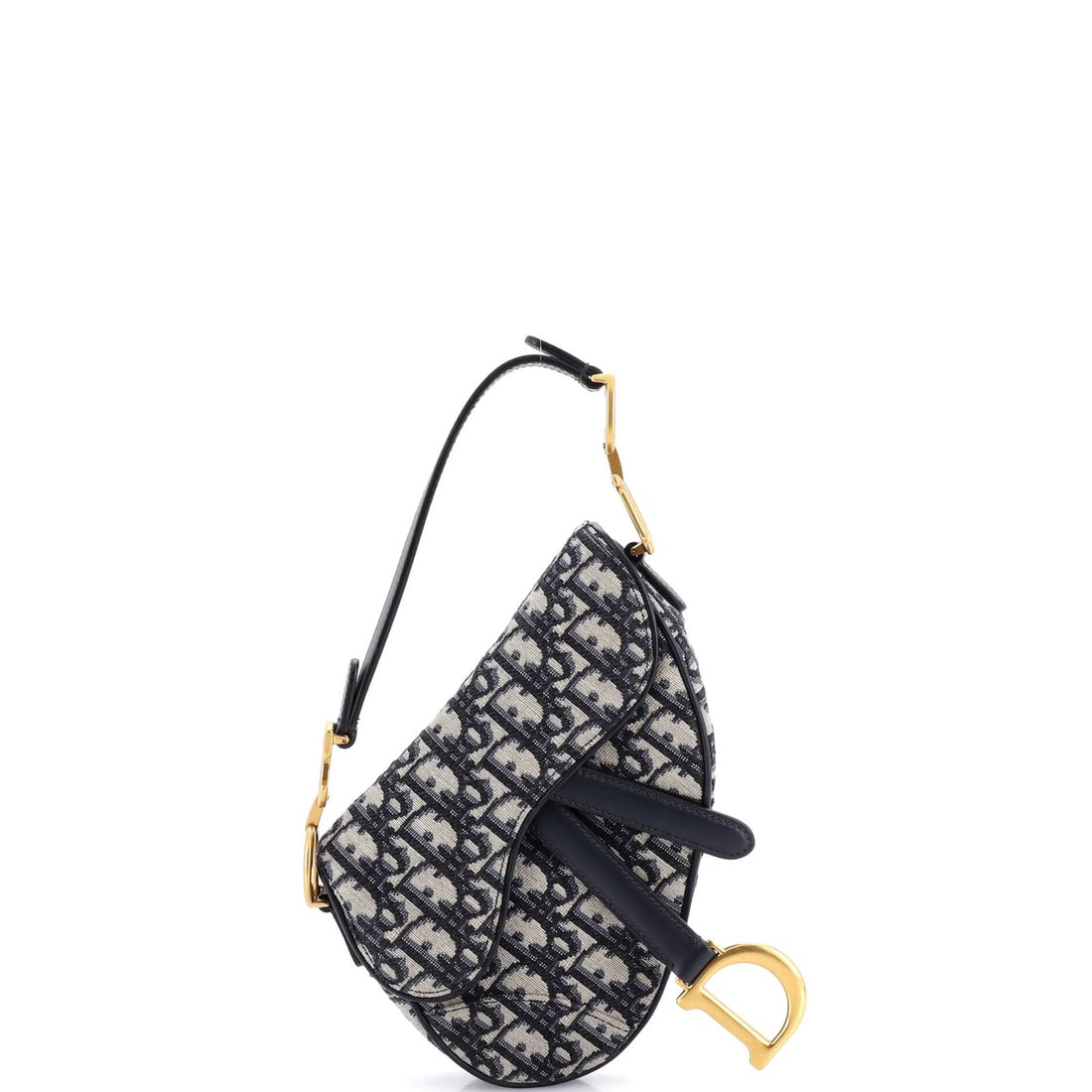 Canvas Mini Bag Christian Dior Oblique Saddle: Canvas Mini Bag Christian Dior Oblique Saddle Canvas Mini Bag Christian Dior Oblique Saddle features a striking blue canvas exterior with neutral interior and aged gold hardware. This miniature should
