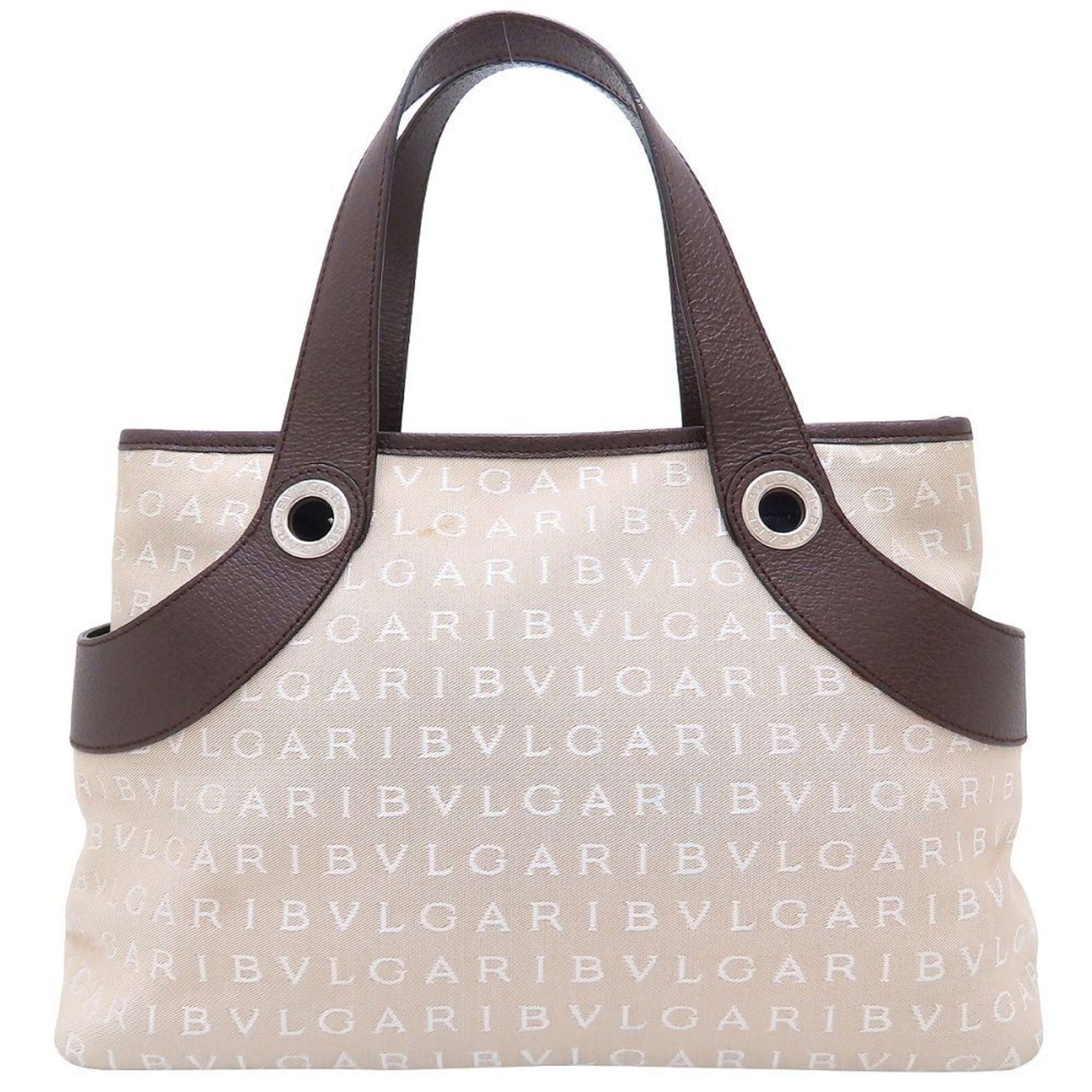 Bvlgari Handbag Canvas Leather: Bvlgari Handbag Canvas Leather Canvas and leather come together in this understated beige brown Bvlgari handbag, featuring a zipper closure. The bag's canvas material has developed some scratches and