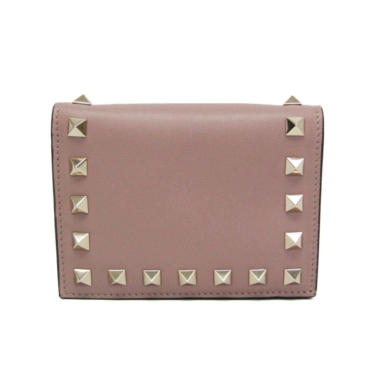 Valentino Garavani Wallet (Bi-Fold) Leather: Valentino Garavani Wallet (Bi-Fold) Leather The Valentino Garavani Wallet in Pink Beige features a sleek bi-fold design with a snap fastener closure and inner pocket for added convenience. This high-q