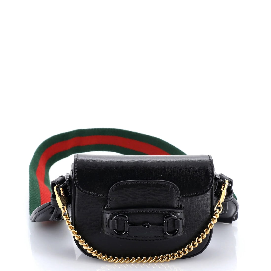 Horsebit Wallet Flap 1955 Strap Leather with Gucci: Horsebit Wallet Flap 1955 Strap Leather with Gucci The Horsebit 1955 Flap Wallet with Strap Leather from Gucci features a classic black exterior with gold hardware and a neutral interior. This iconic 