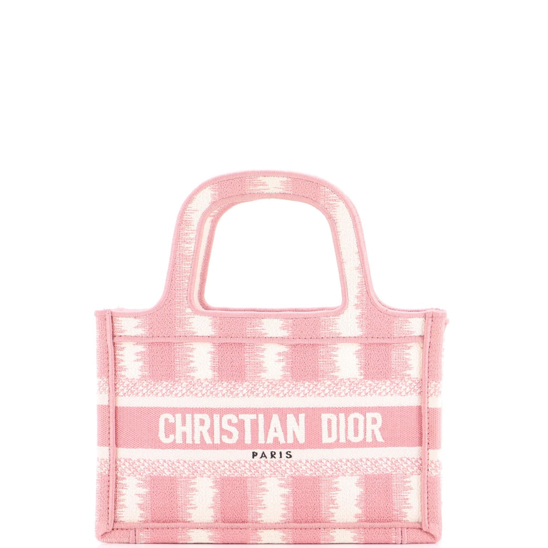 Christian Dior book tote canvas mini: Christian Dior book tote canvas mini The Christian Dior book tote canvas mini in pink features a classic design with embroidered canvas and a compact size. With its pilling exterior and minor fraying,