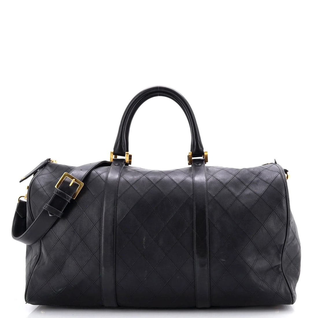 Boston bag quilted lambskin large diamond vintage Chanel: Boston bag quilted lambskin large diamond vintage Chanel The Boston bag quilted lambskin large diamond vintage Chanel features a striking black leather exterior with a quilted design and gold