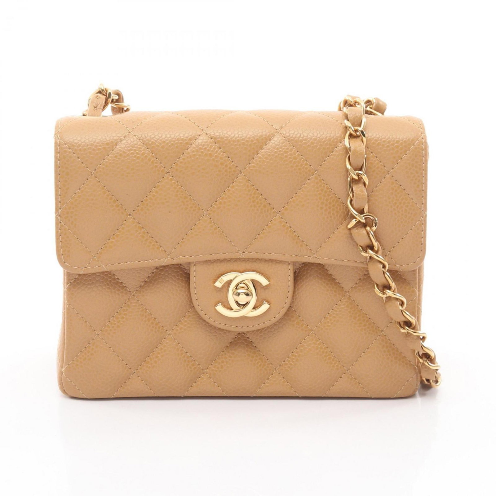 Chanel Handbag Shoulder Bag Leather: Chanel Handbag Shoulder Bag Leather Chanel's classic shoulder bag in beige calfskin leather features gold hardware and a timeless design. With its compact size and elegant lines, this handbag is perfe
