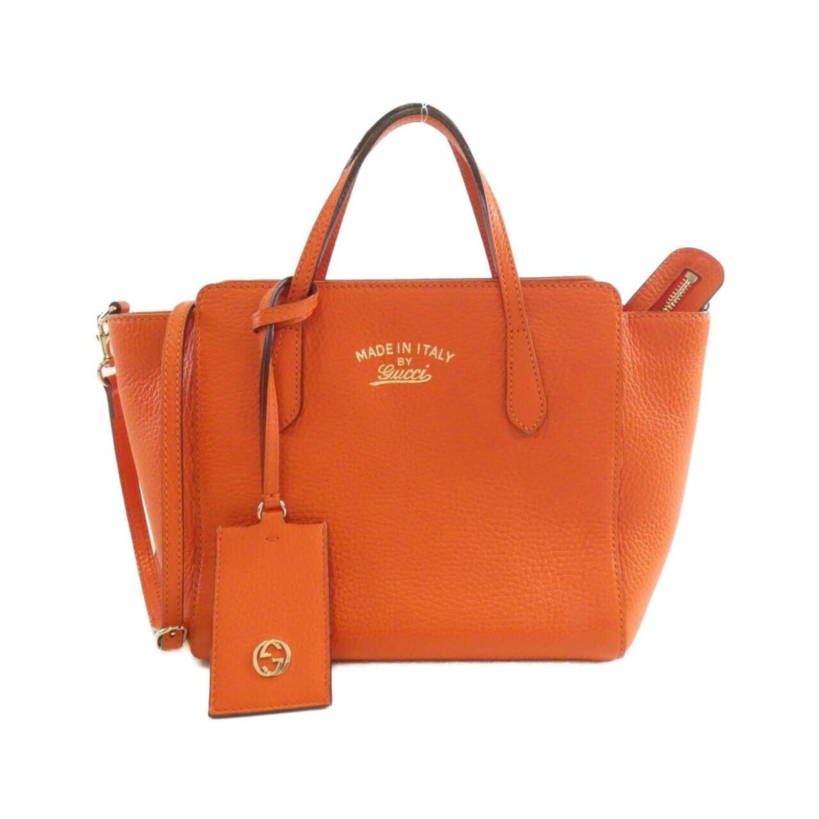 Gucci Handbag Leather: Gucci Handbag Leather Gucci Handbag Leather is a vibrant orange leather handbag with gold hardware. Measuring 19cm x 21cm x 10cm, this used handbag features traces of usage and minor damages/dirt, sti