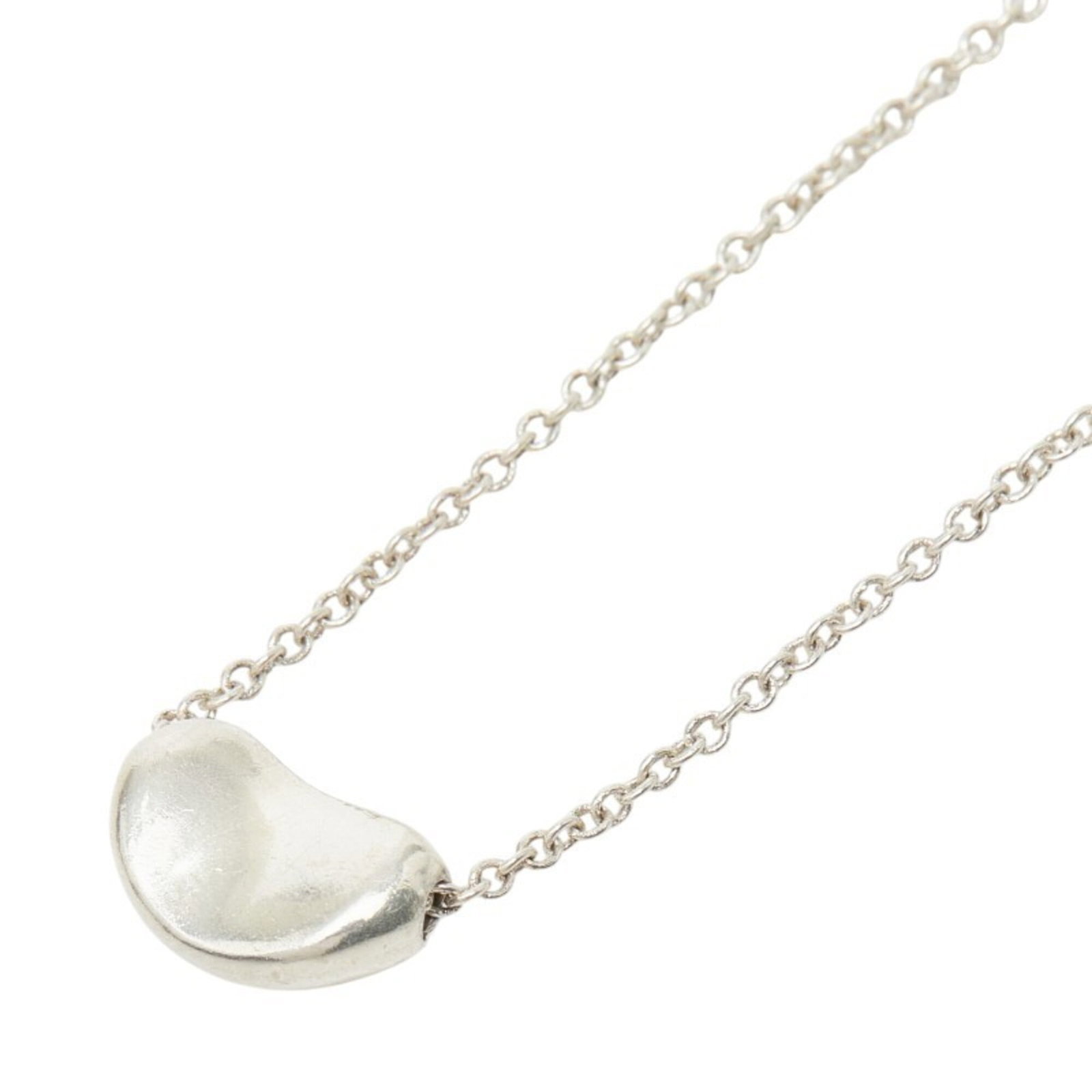 Tiffany & Co. Bean Necklace Sv925 Silver Women'S.: Tiffany & Co. Bean Necklace Sv925 Silver Women'S. Tiffany & Co. Bean Necklace in sterling silver (925) features a classic design with a 6.8mm x 10.6mm pendant. The necklace has a comfortable neck