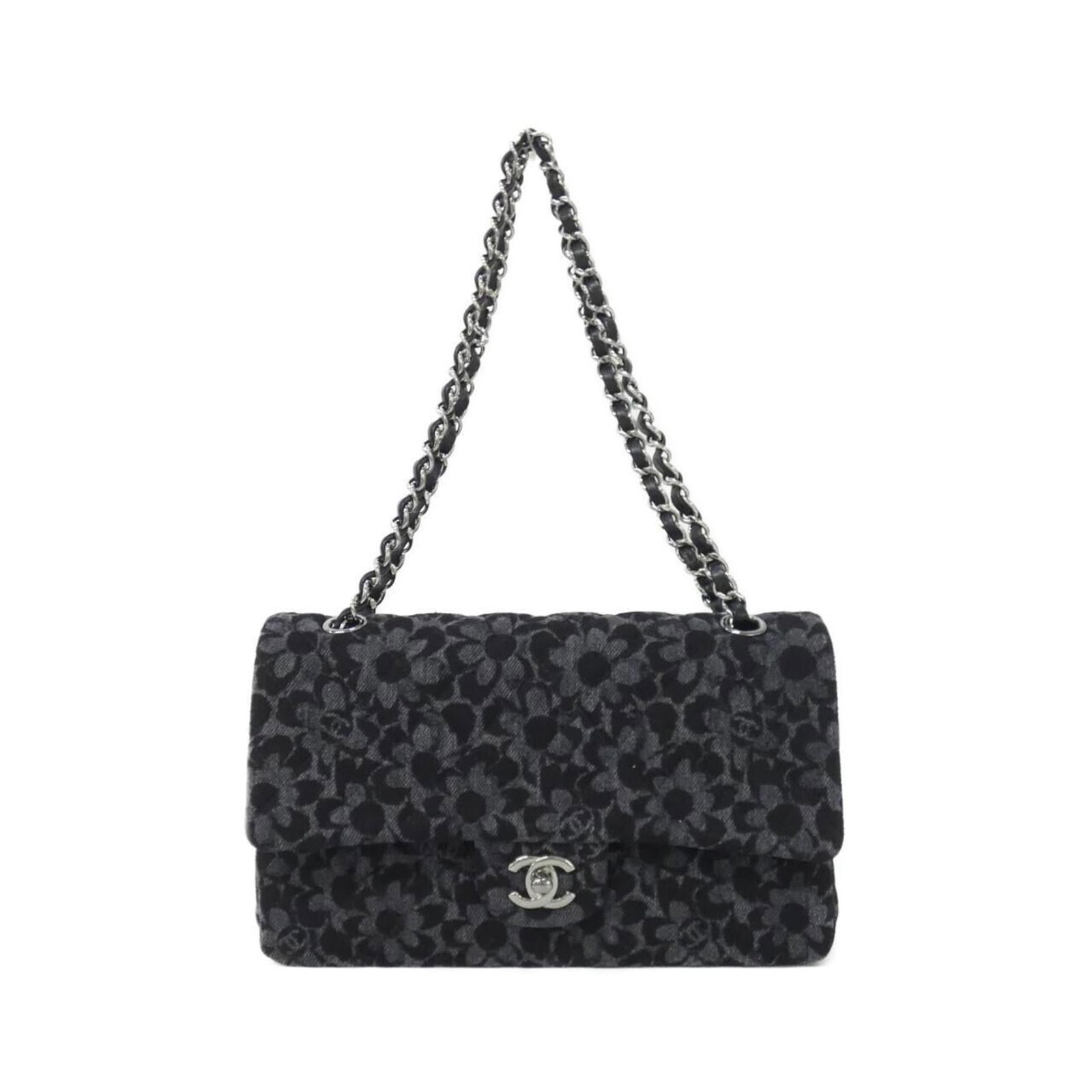 Chanel Shoulder Bag Denim: Chanel Shoulder Bag Denim Chanel's iconic denim shoulder bag features a timeless black and gray color combination with sleek silver hardware. Made from high-quality denim, this versatile bag measures 