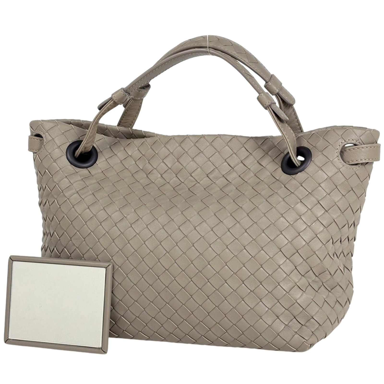 Bottega Veneta Handbag Leather: Bottega Veneta Handbag Leather Bottega Veneta Handbag Leather is a pre-owned grayish leather handbag with a classic design. The bag features a size of 19.5cm x 24cm x 10.5cm and has traces of usage, s