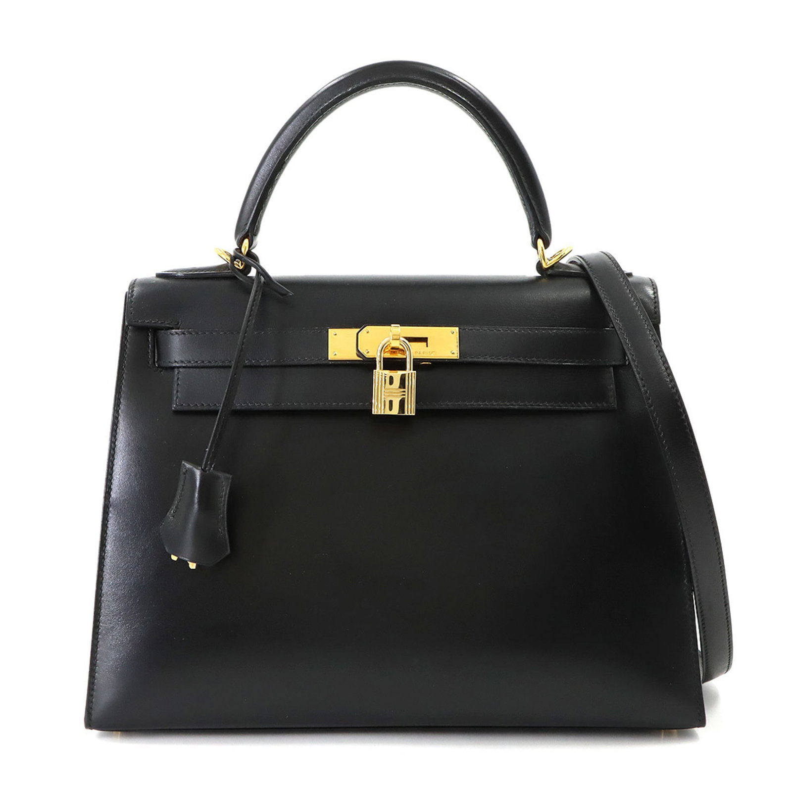 Hermes Handbag Box Calf Leather: Hermes Handbag Box Calf Leather Box Calf Leather Handbag from Hermes, crafted with attention to detail and made from high-quality box calf leather. This black handbag measures 21cm x 29cm x 11.5cm and