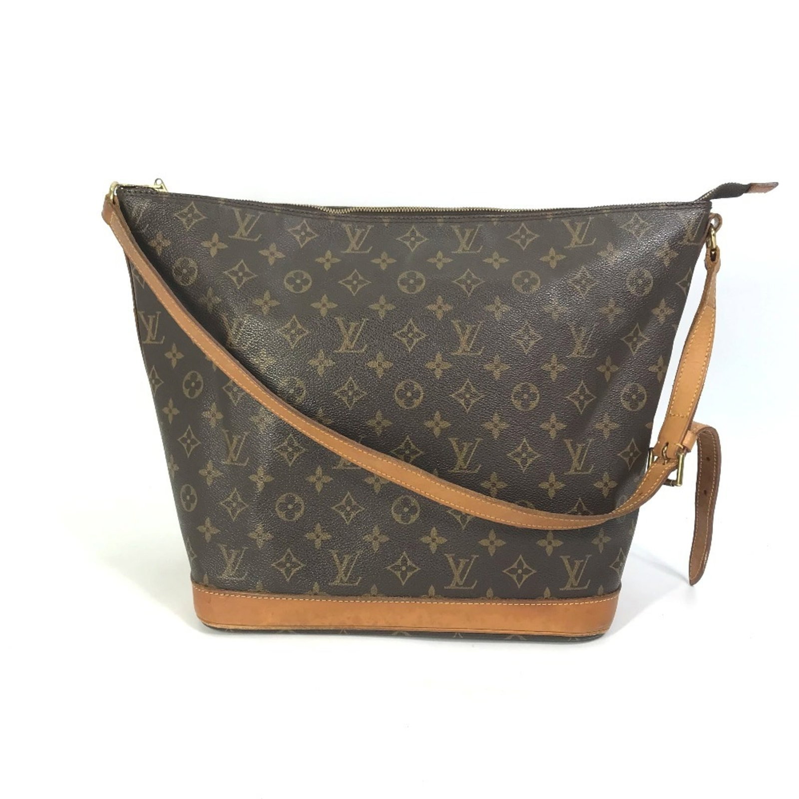 Louis Vuitton Shoulder Bag Monogram: Louis Vuitton Shoulder Bag Monogram This Louis Vuitton Shoulder Bag Monogram features the iconic brand's signature brown monogram pattern. With its sturdy construction and classic design, this bag