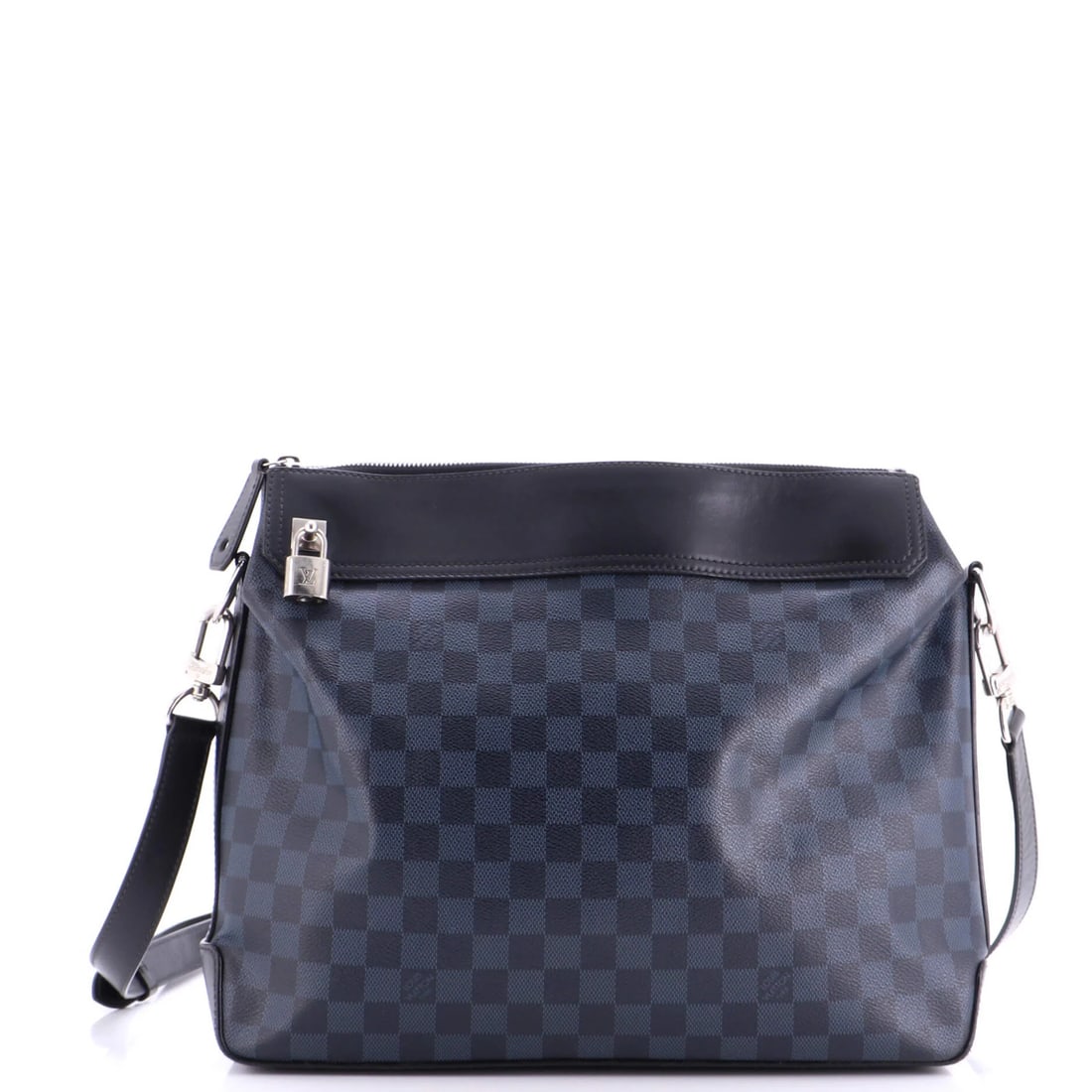 Damier cobalt messenger bag by Louis Vuitton: Damier cobalt messenger bag by Louis Vuitton The Damier Cobalt messenger bag from Louis Vuitton boasts a striking black canvas exterior with silver hardware. With its classic cross-body design and