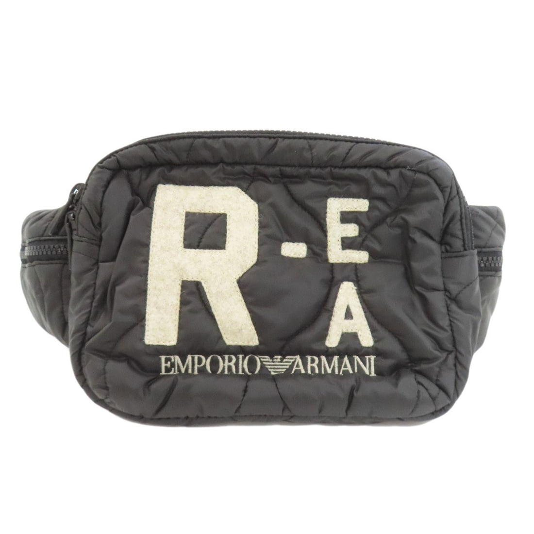 Nylon Emporio Armani Logo Body Bag: Nylon Emporio Armani Logo Body Bag Black nylon body bag with Emporio Armani logo. Made from durable nylon material and featuring a sleek black exterior design. Authentic Emporio Armani logo on the