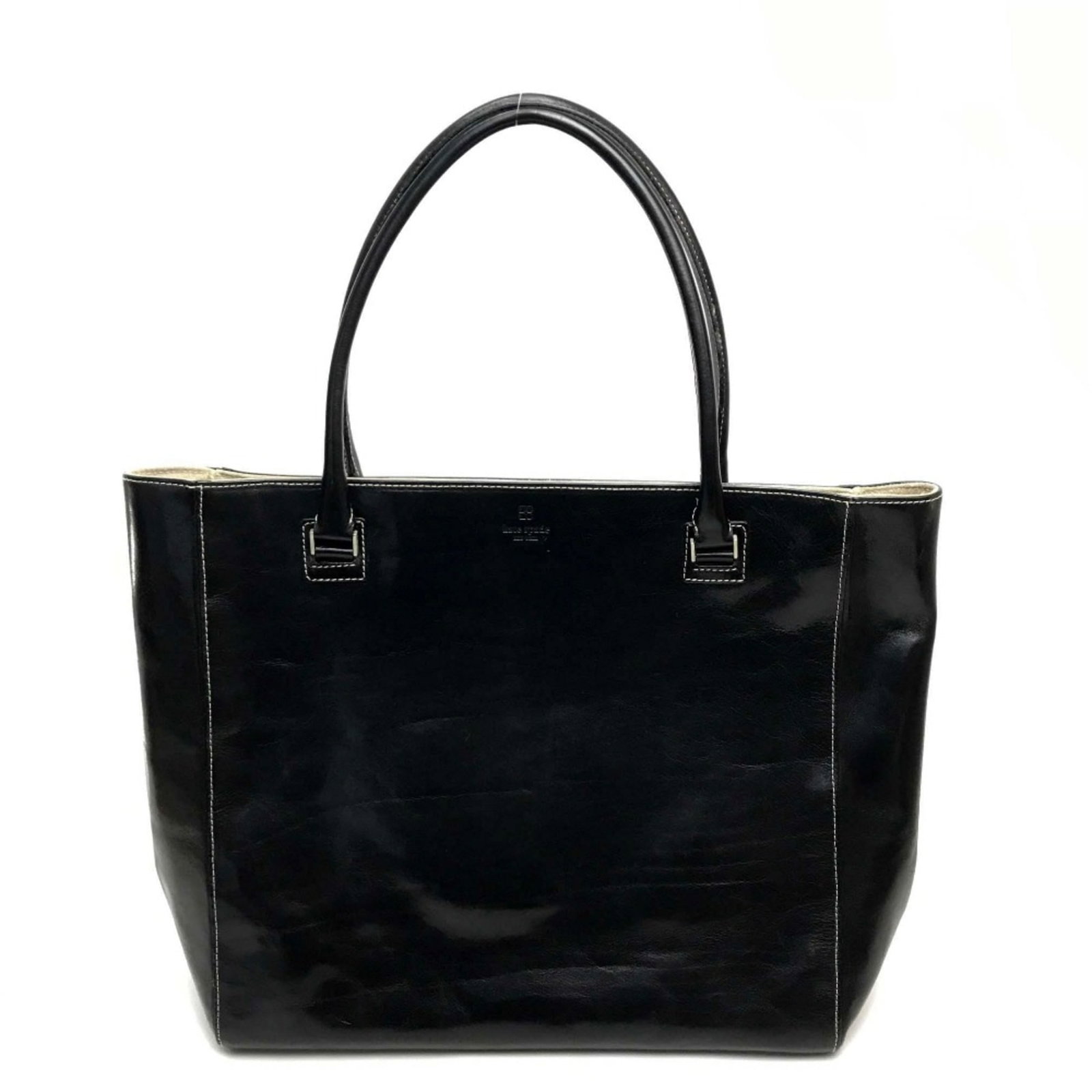 Kate Spade Tote Bag Leather: Kate Spade Tote Bag Leather This black Kate Spade leather tote bag features a classic design with clean lines and a timeless aesthetic. Measuring 35cm x 33cm x 12cm, it offers ample space for daily es