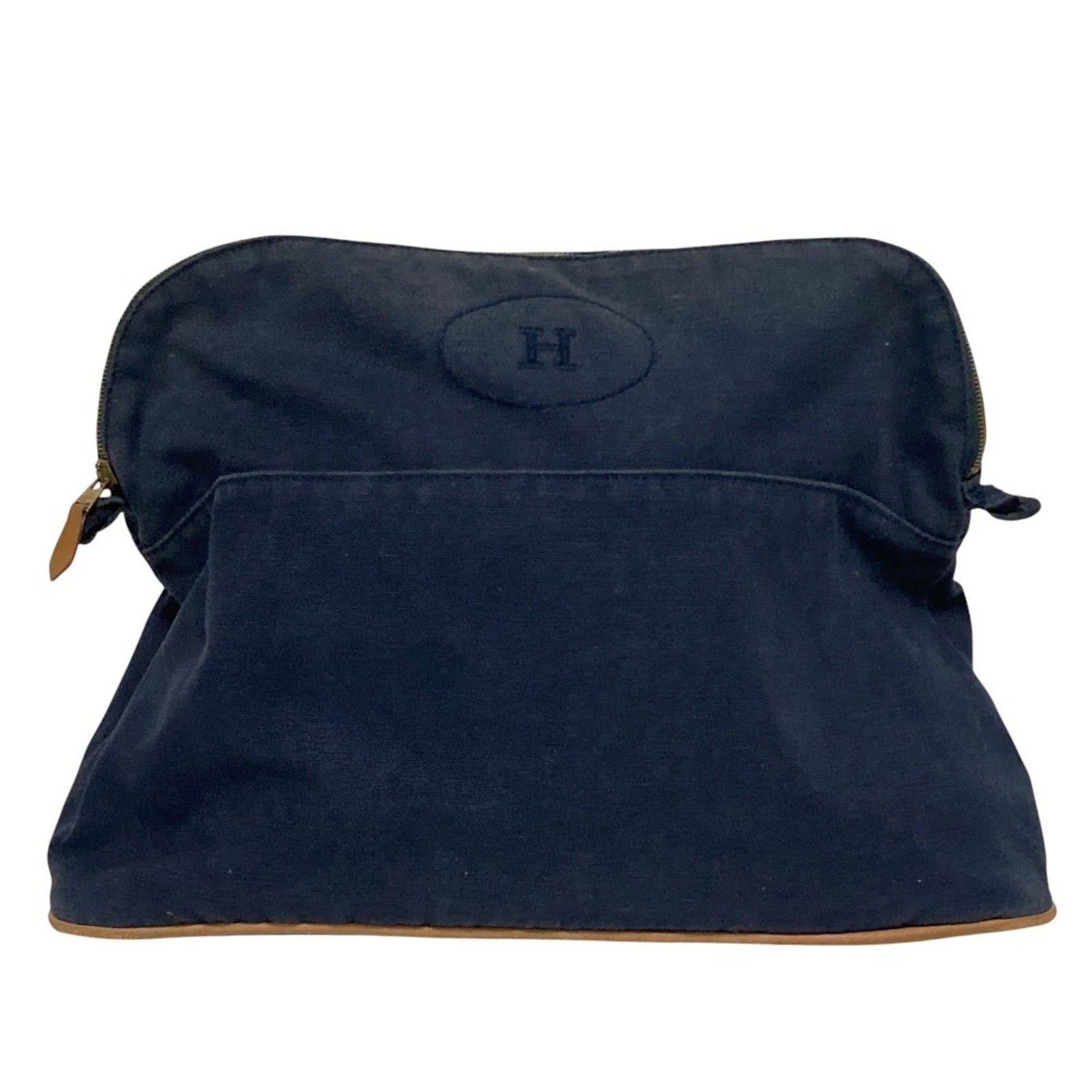 Hermes Pouch Canvas: Hermes Pouch Canvas Navy canvas Hermes pouch in very good condition, with a few traces of usage and minor scratches. The classic design and timeless style make this a versatile accessory for everyday