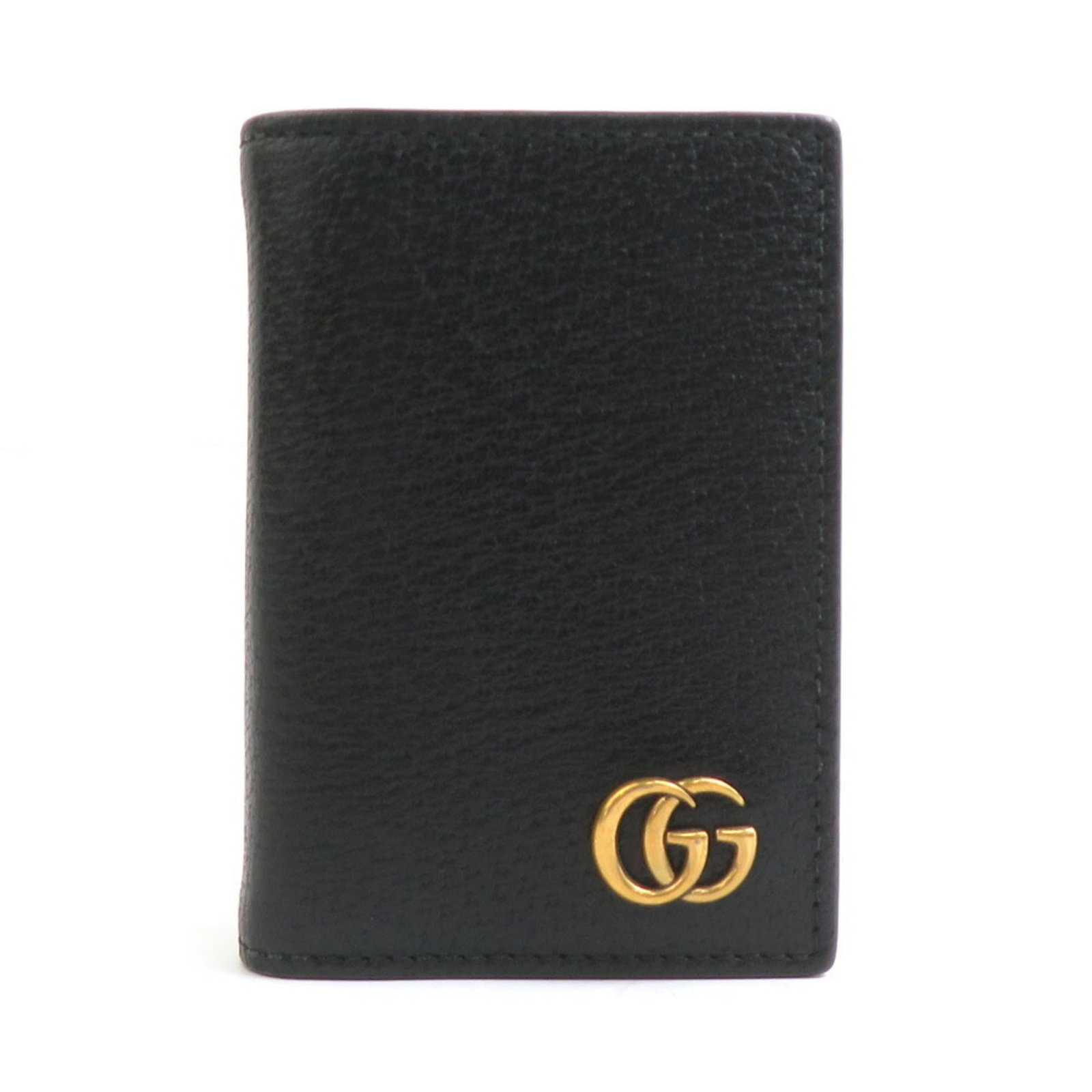 Gucci Card Case Leather: Gucci Card Case Leather This Gucci card case leather is made from high-quality black leather with traces of usage visible. The condition shows minor scratches and dirt, indicating it has been handled