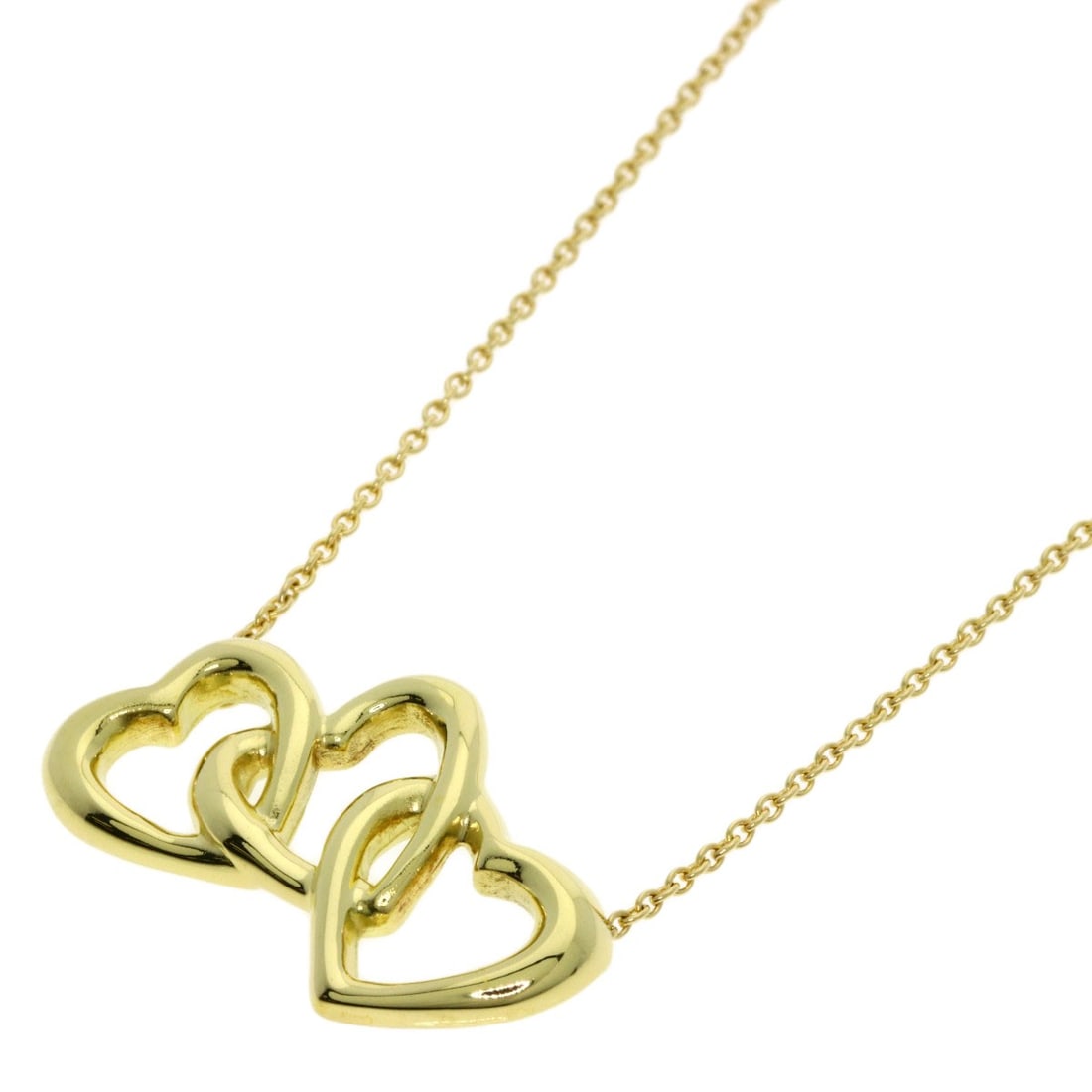 Triple heart necklace Tiffany Co K18 Yellow gold: Triple heart necklace Tiffany Co K18 Yellow gold The Tiffany Co K18 Yellow gold triple heart necklace boasts a striking design with its K18 yellow gold material and 16.5-inch length. This elegant