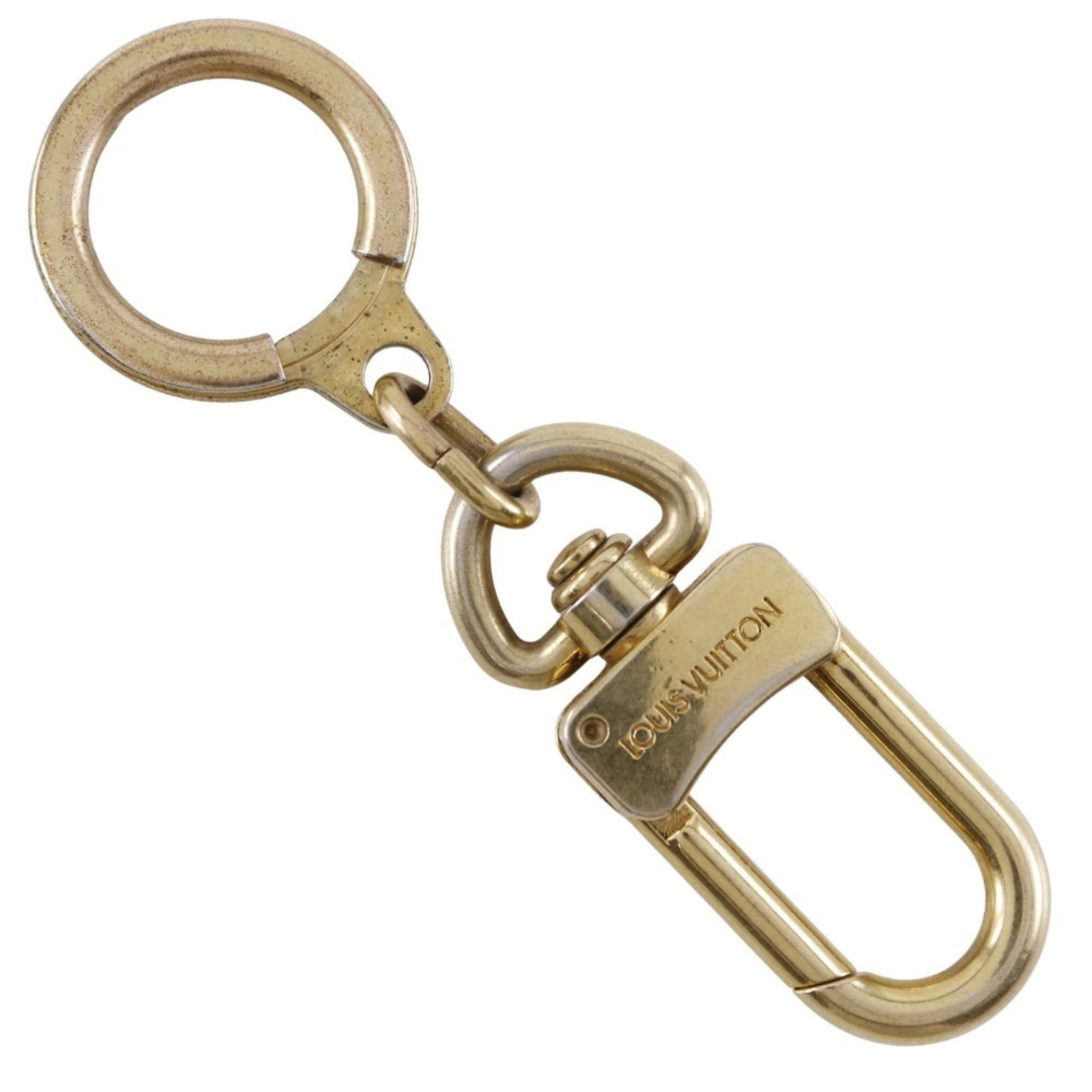 Louis Vuitton Keyring Gold Plating: Louis Vuitton Keyring Gold Plating Gold Plating Keyring from Louis Vuitton, bearing subtle traces of usage and minor scratches. Made from gold plating material, this keyring features a classic design 