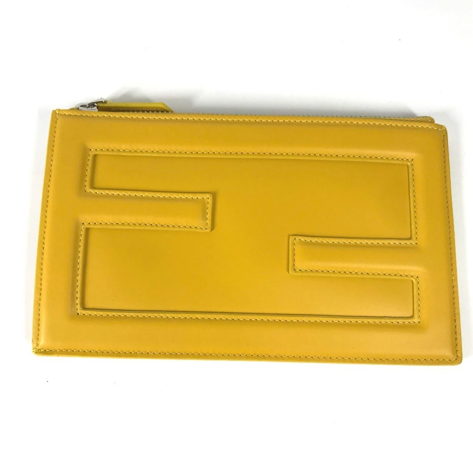 Fendi Clutch Bag Pouch Leather: Fendi Clutch Bag Pouch Leather Fendi's Clutch Bag Pouch Leather is a vibrant yellow leather pouch with an open condition. Measuring 11cm x 18.5cm, this compact bag features high-quality leather materi