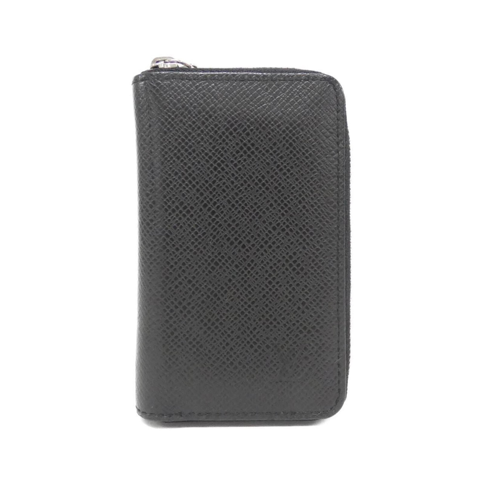 Louis Vuitton Coin Purse/Coin Case Leather: Louis Vuitton Coin Purse/Coin Case Leather The Louis Vuitton Coin Purse/Coin Case Leather is a classic accessory made from high-quality calf leather. With its sleek black design and compact size, this