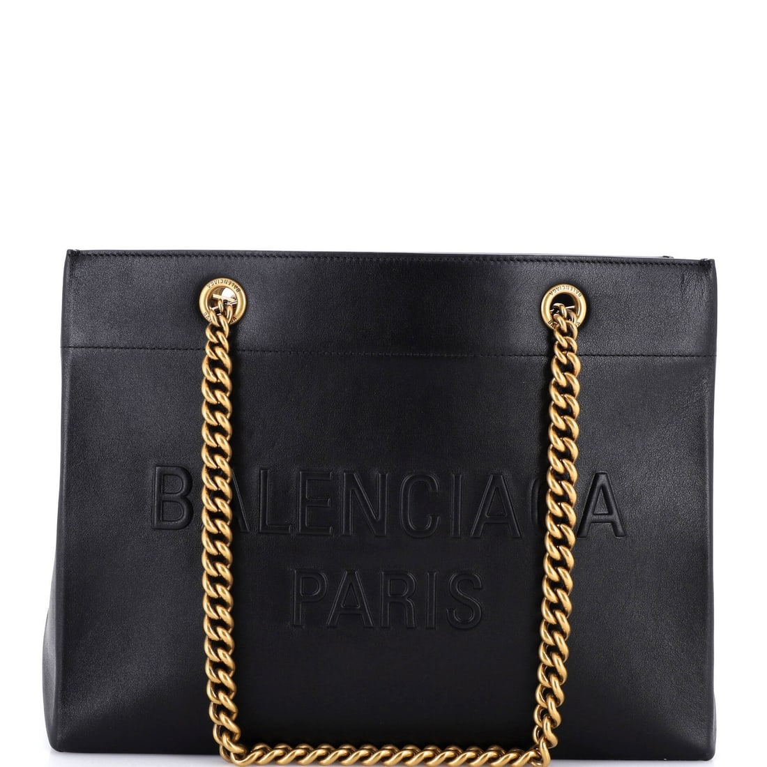 Leather Chain Medium Duty Free Tote Balenciaga: Leather Chain Medium Duty Free Tote Balenciaga The Balenciaga Leather Chain Medium Duty Free Tote boasts sleek, black leather exterior with aged gold hardware, adding an air of sophistication to its