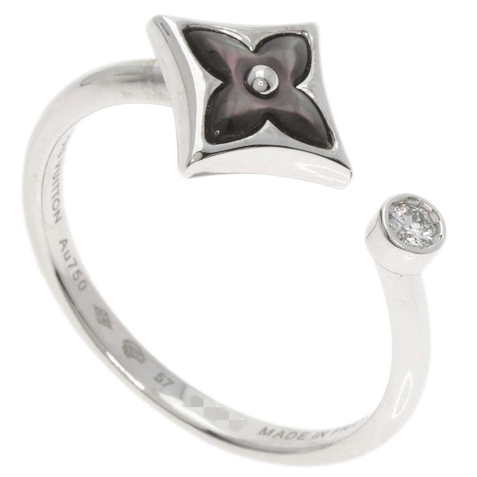 Louis Vuitton Band Ring White Gold (18K): Louis Vuitton Band Ring White Gold (18K) This Louis Vuitton band ring features 18K white gold craftsmanship. The ring showcases a few traces of usage, with some minor scratches and dirt visible, yet r