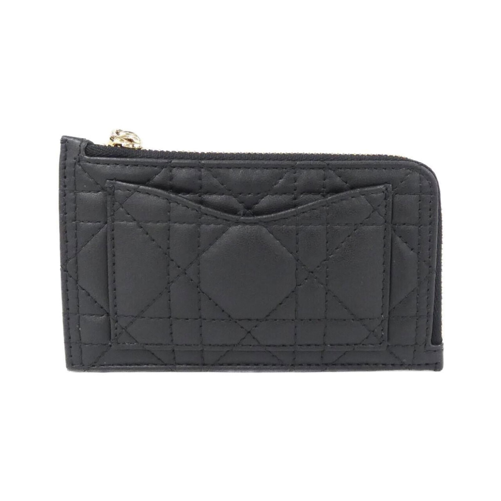 Christian Dior Coin Purse/Coin Case Leather: Christian Dior Coin Purse/Coin Case Leather The Christian Dior Coin Purse/Coin Case Leather is a sleek and sophisticated accessory. Made from high-quality lambskin leather, this classic coin purse fea