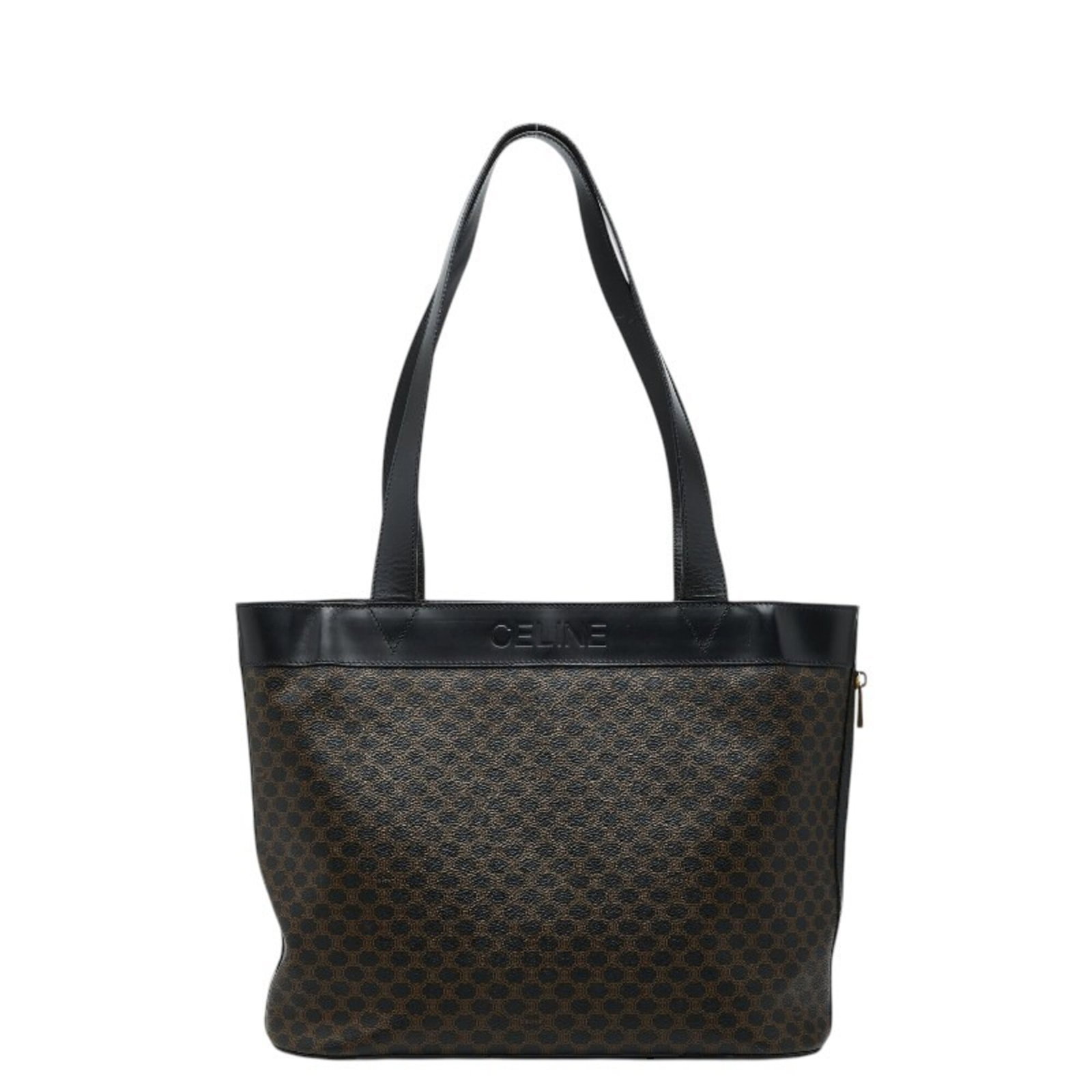 Celine Tote Bag Pvc Leather: Celine Tote Bag Pvc Leather The Celine Tote Bag Pvc Leather features a sleek black and brown design with a hook closure. Measuring 27cm x 35cm x 16.5cm, this used tote bag has visible scratches and