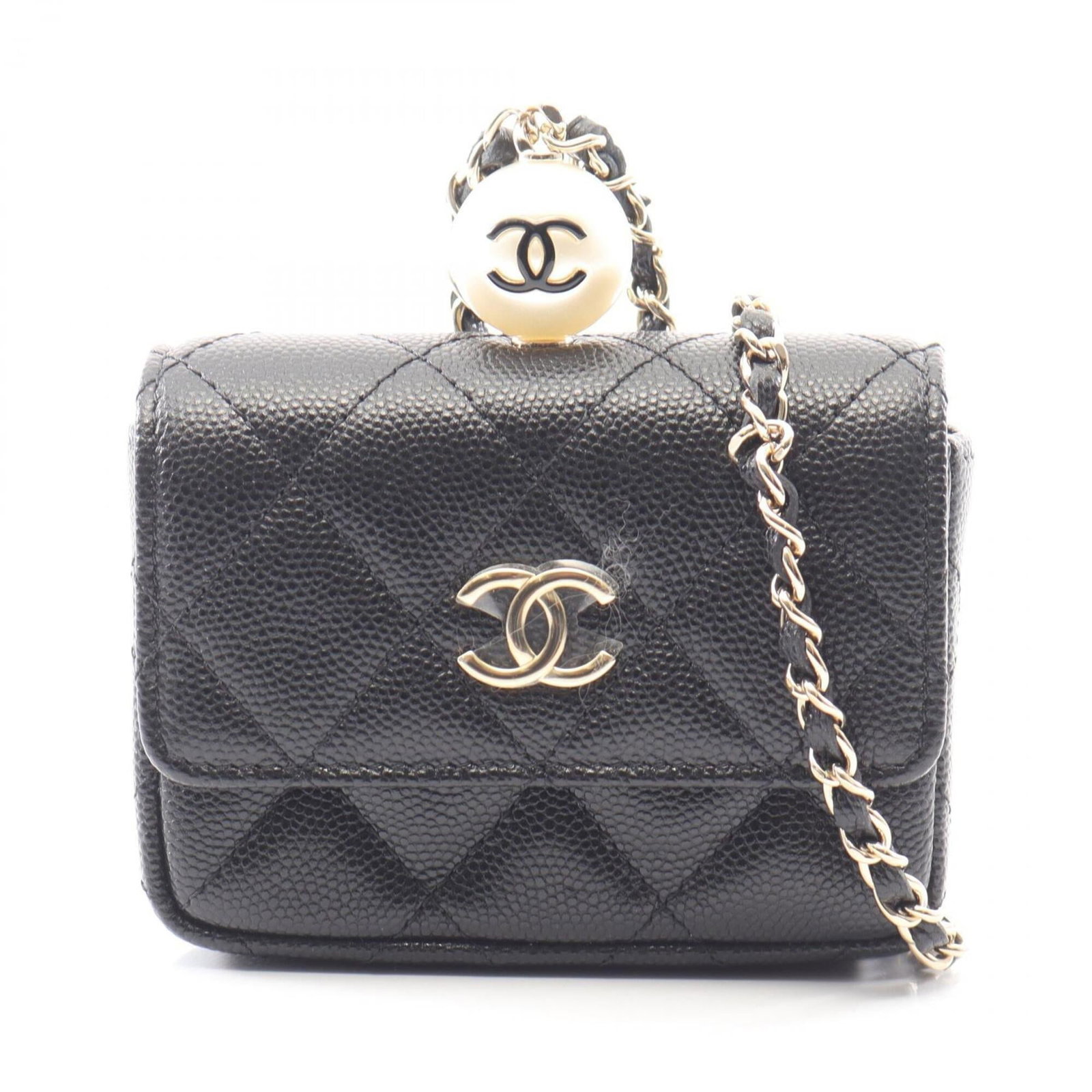 Chanel Coin Purse/Coin Case Leather: Chanel Coin Purse/Coin Case Leather The Chanel Coin Purse/Coin Case Leather is a sleek and sophisticated accessory made from high-quality calfskin leather. Its classic design features a timeless black