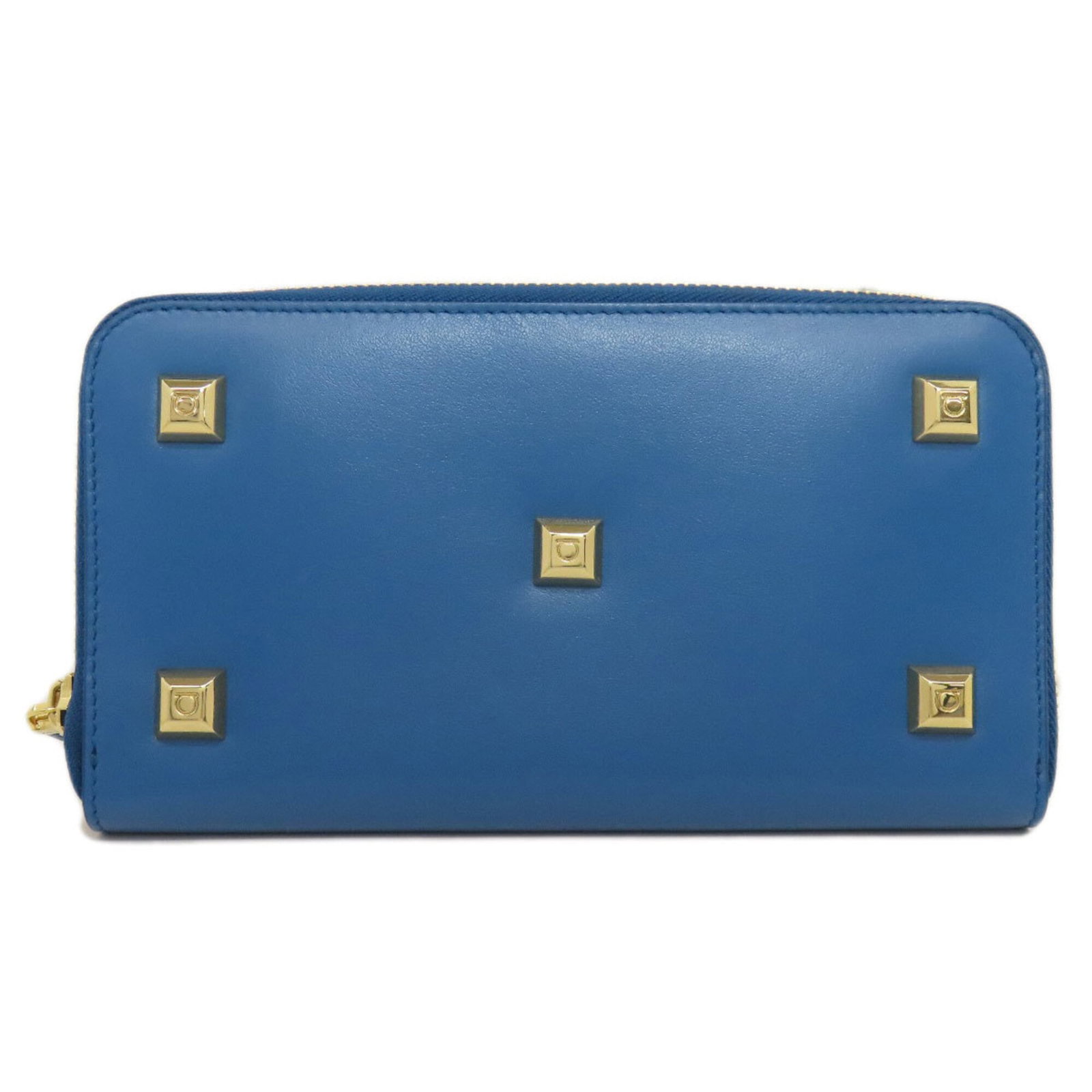 Salvatore Ferragamo Long Wallet (Bi-Fold) Leather: Salvatore Ferragamo Long Wallet (Bi-Fold) Leather Salvatore Ferragamo's iconic long wallet features a sleek blue leather design with a bi-fold closure. With its classic style and durable