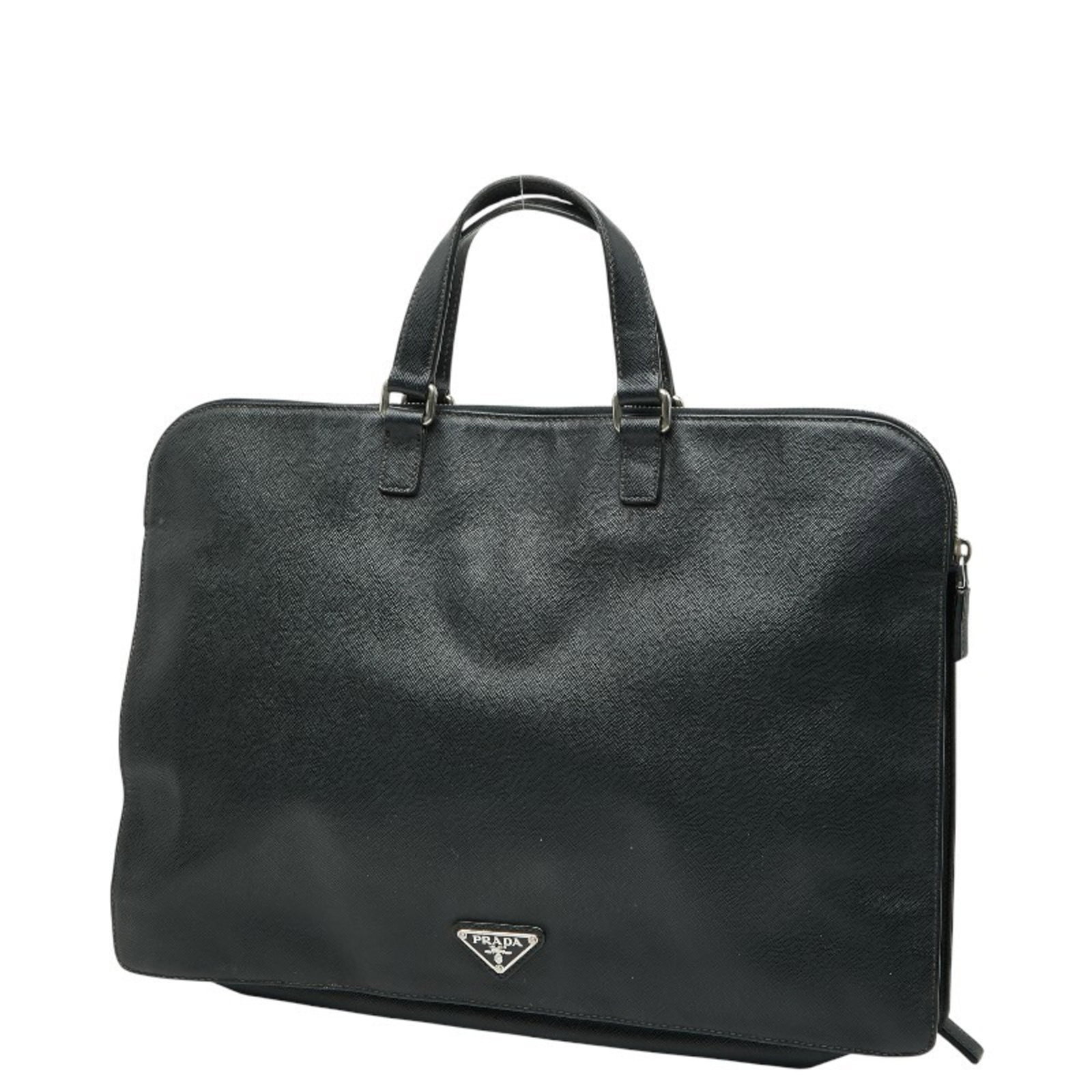 Prada Handbag Leather: Prada Handbag Leather Saffiano leather construction provides durability and style in this black Prada handbag. The bag features a classic design with a size of 28cm x 40cm x 3.5cm, making it a versati