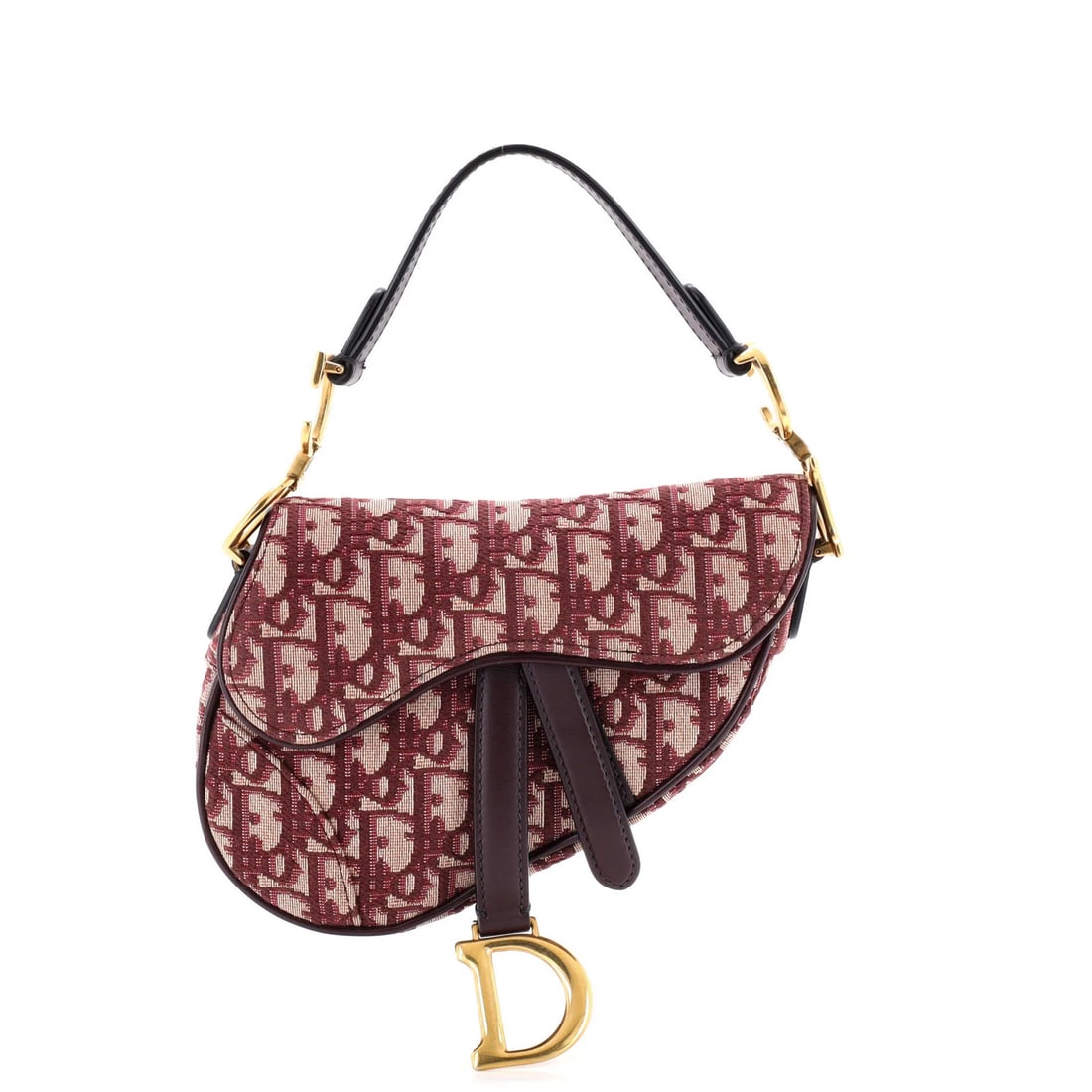 Canvas Mini Bag Christian Dior Oblique Saddle: Canvas Mini Bag Christian Dior Oblique Saddle The Christian Dior Oblique Saddle Mini Bag features a striking red canvas exterior with neutral interior and aged gold hardware. This mini shoulder bag bo