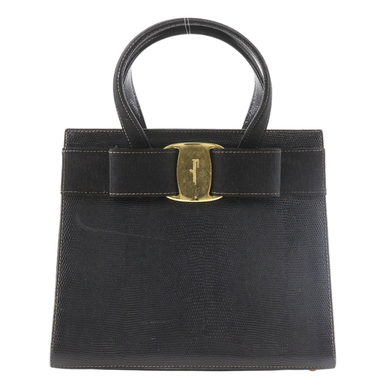 Salvatore Ferragamo Handbag Leather: Salvatore Ferragamo Handbag Leather Black Salvatore Ferragamo handbag with embossed leather exterior, featuring a timeless design and classic style. The bag measures 21cm x 24cm x 10cm and has traces