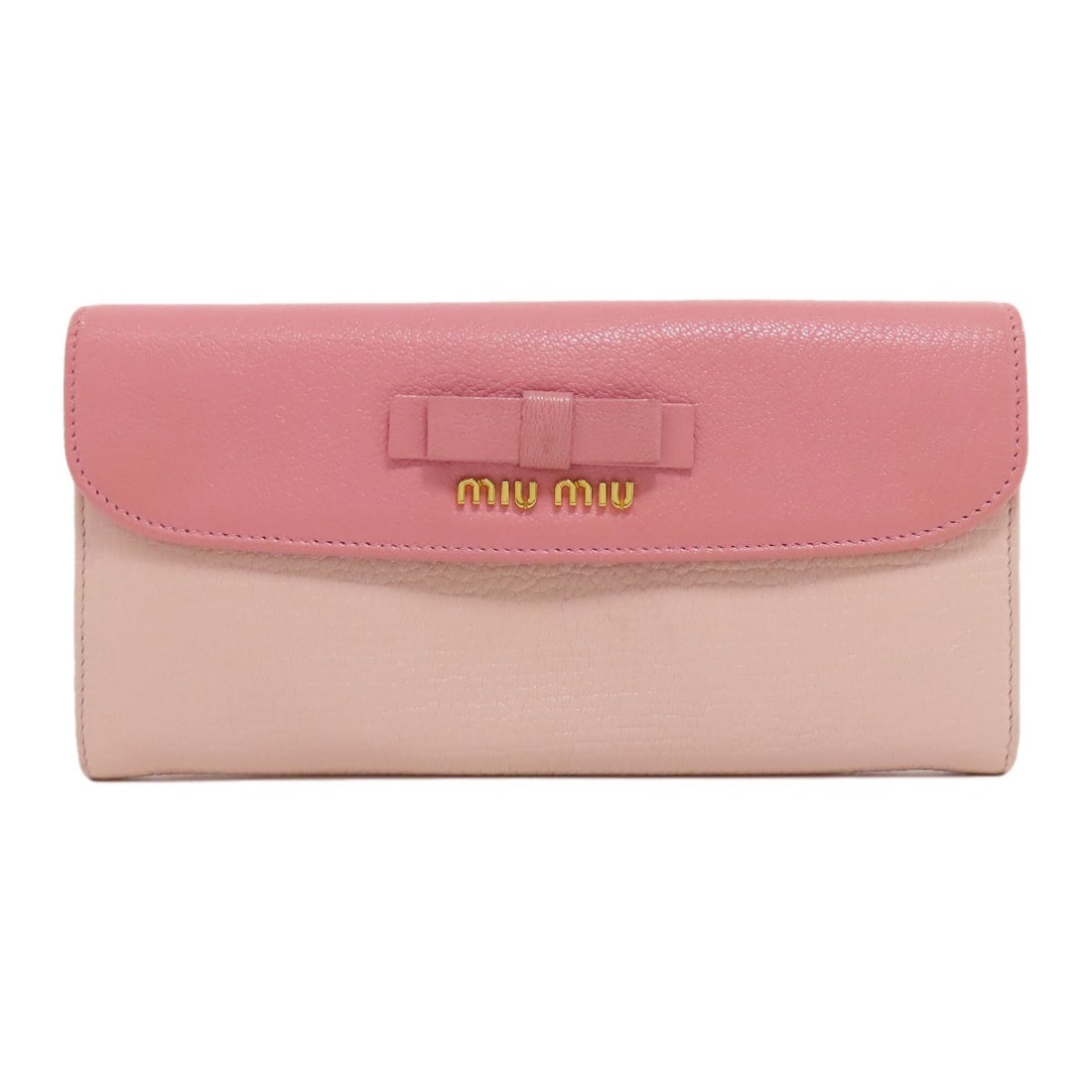 Logo Ribbon Long Wallet Leather With Coin: Logo Ribbon Long Wallet Leather With Coin Pink leather long wallet with coin pocket features a stylish design. The exterior color matches the interior, adding a touch of uniformity to this functional 