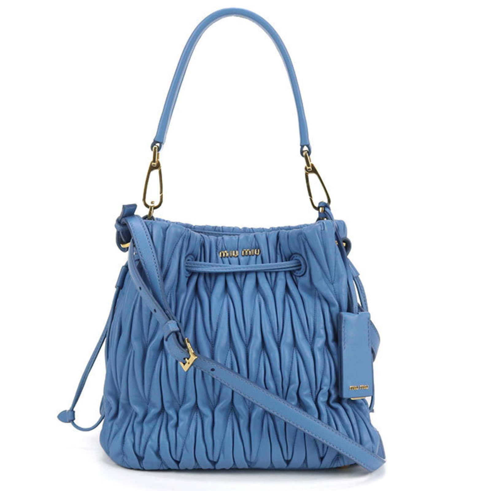 Miu Miu Handbag Leather: Miu Miu Handbag Leather This Miu Miu handbag features high-quality blue leather and gold hardware, showcasing classic Italian style. The bag's condition is excellent, with only minor signs of usage,